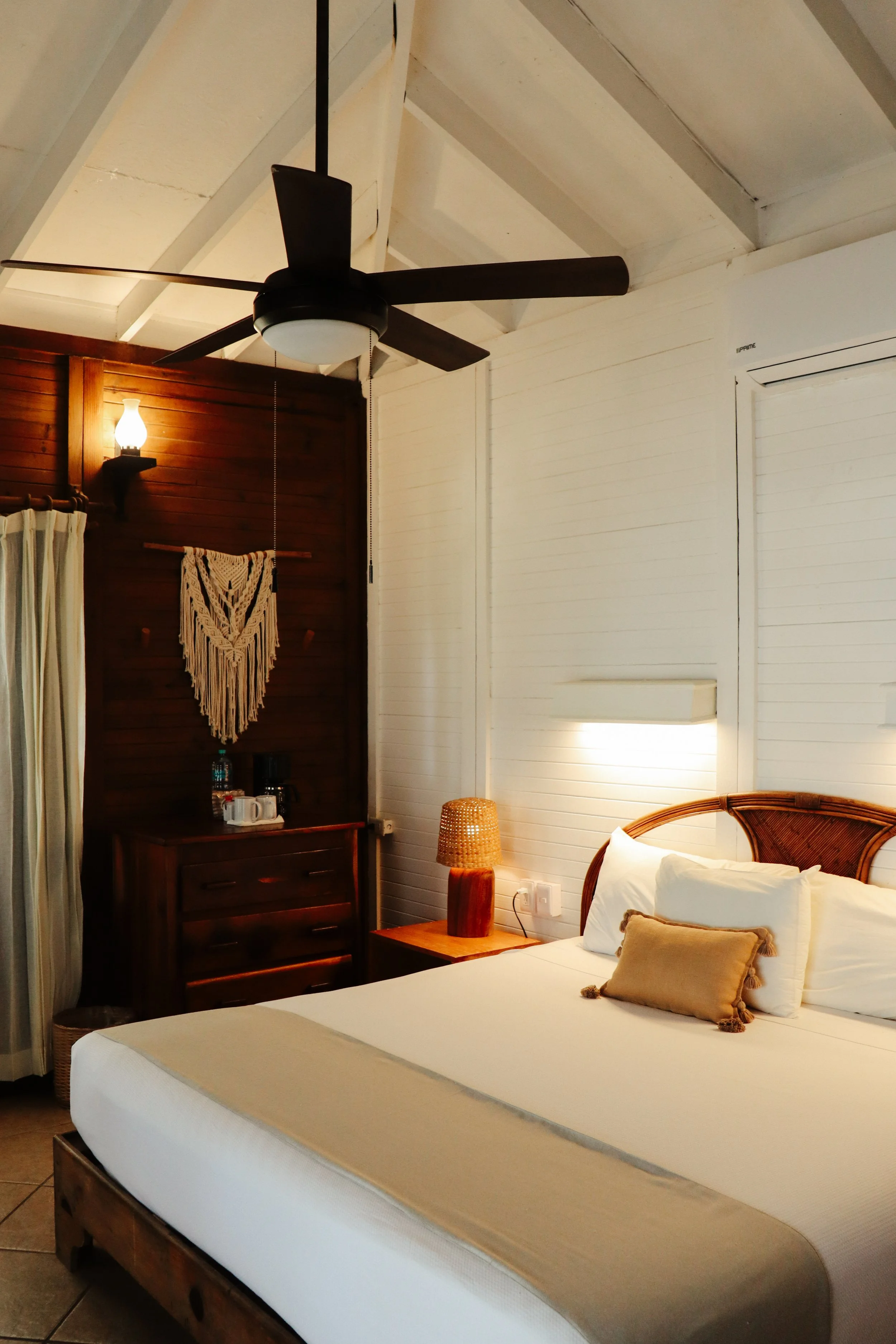 Bright Caribbean-style room with warm wooden details