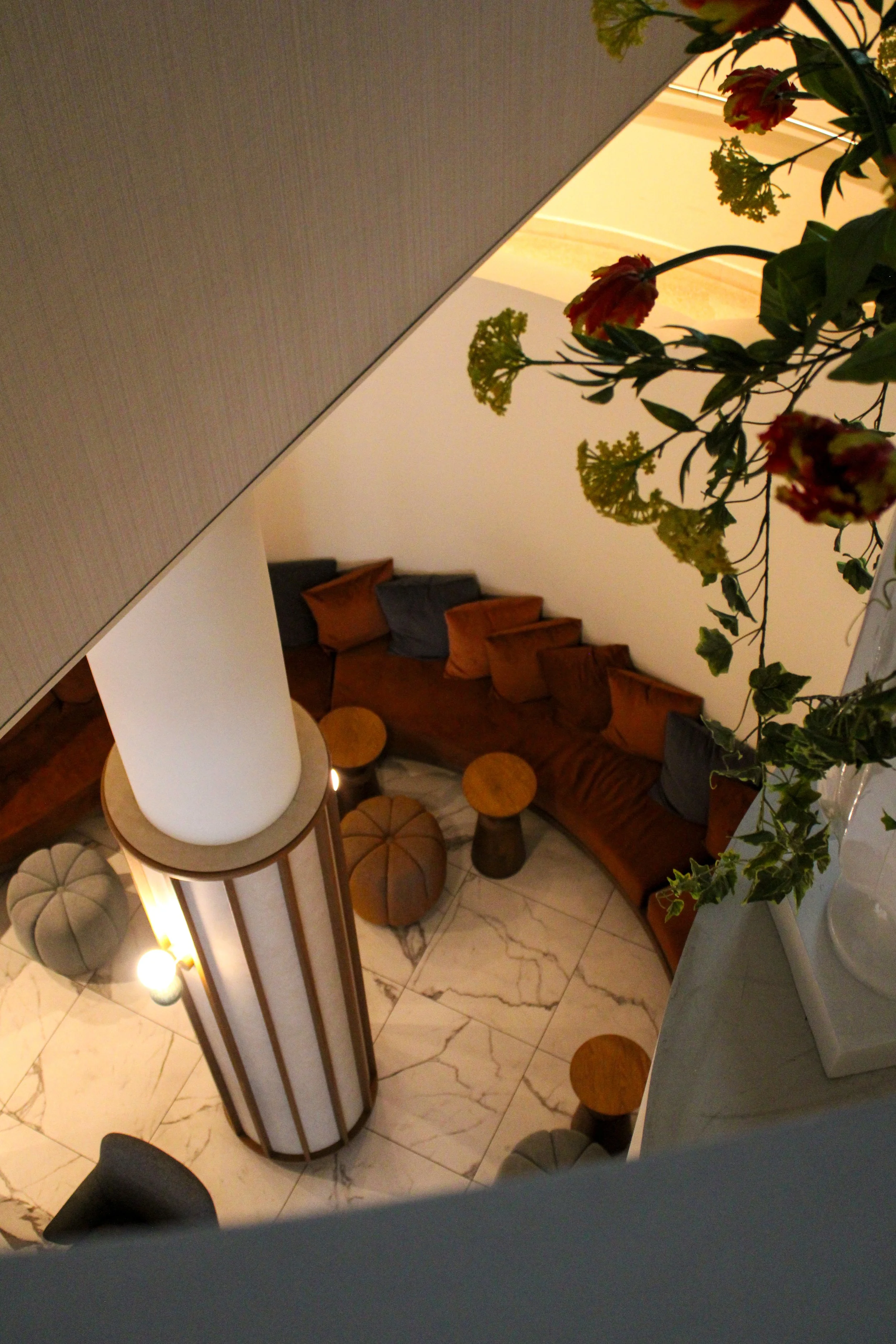 Cozy lounge corner with marble floors and inviting seating areas