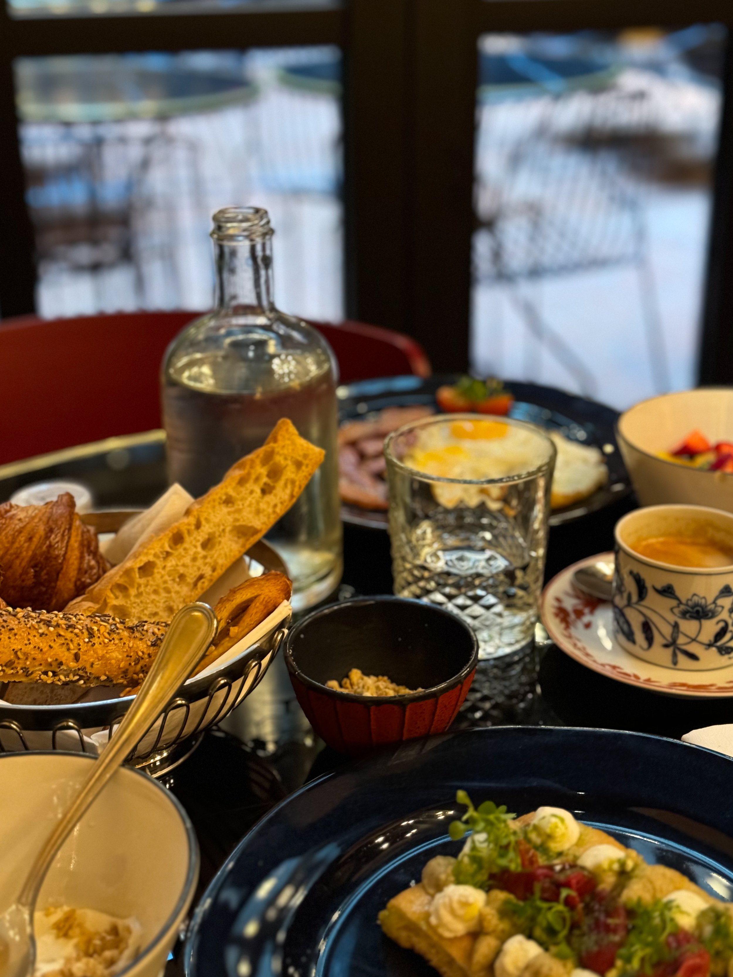 Refined breakfast served at Wittmore Hotel featuring artisan pastries, fresh dishes, and specialty coffee