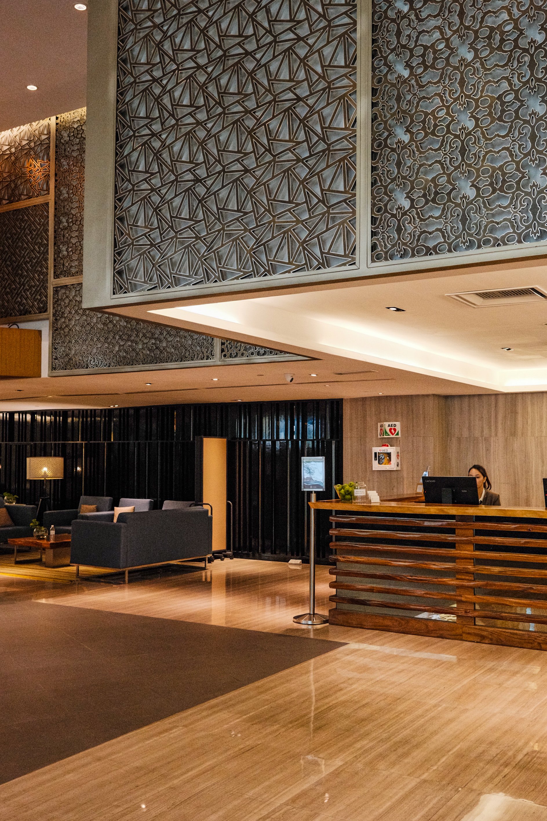 Modern lobby featuring elegant interiors and a welcoming reception area