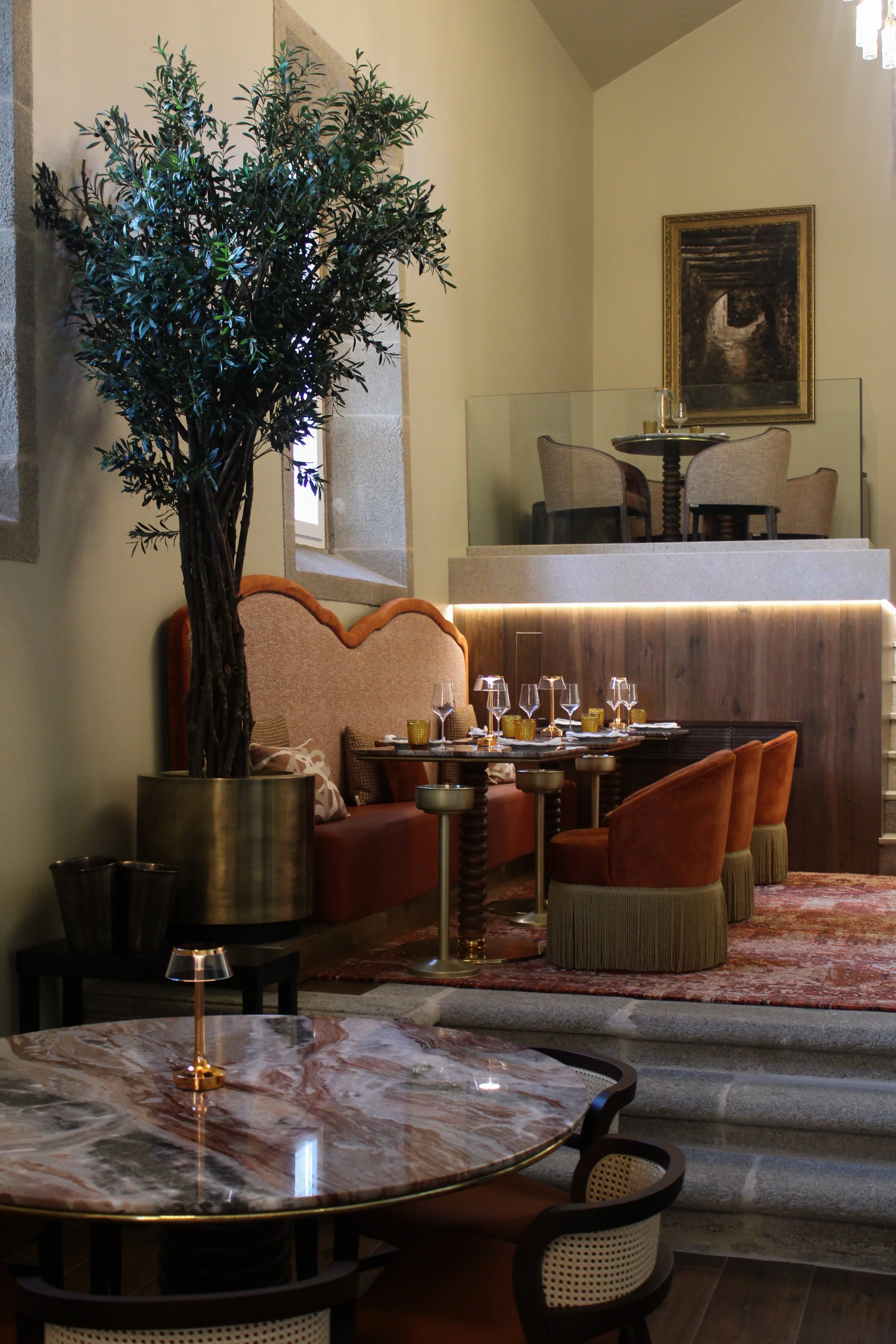 Refined dining area blending historic architecture with contemporary luxury design