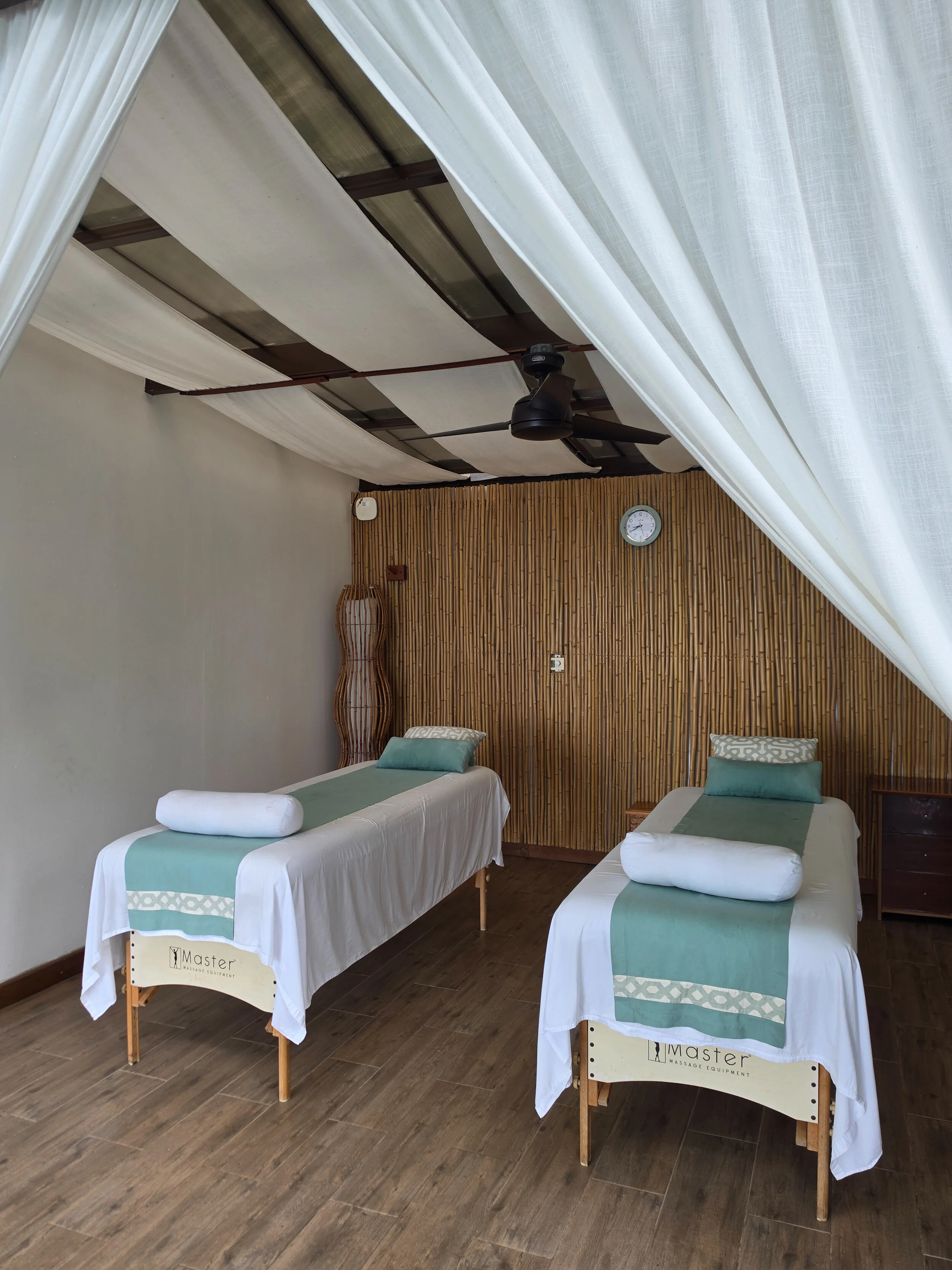 Peaceful spa treatment room designed for couples and wellness experiences