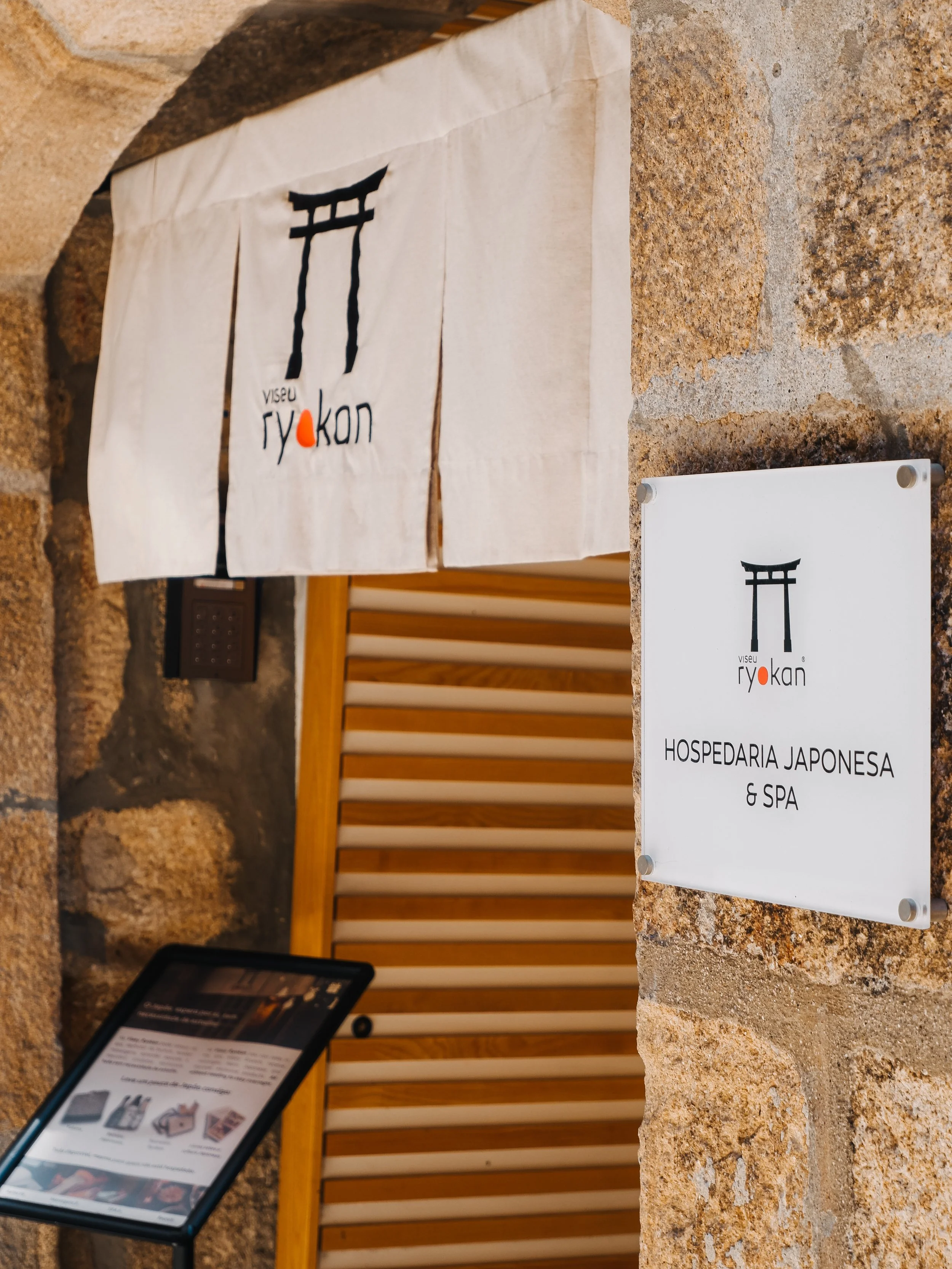 Boutique hospitality entrance combining Portuguese heritage with authentic Japanese design
