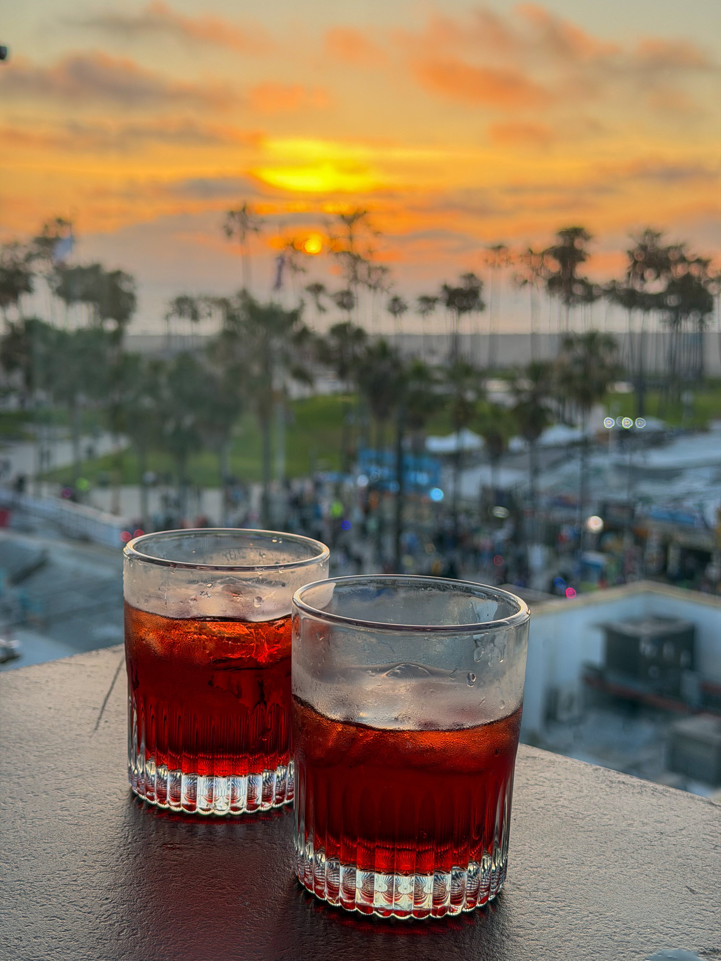 Sunset drinks overlooking Venice Beach, where the energy of the city meets the calm of the ocean, Hotel Erwin – Venice Beach, USA.