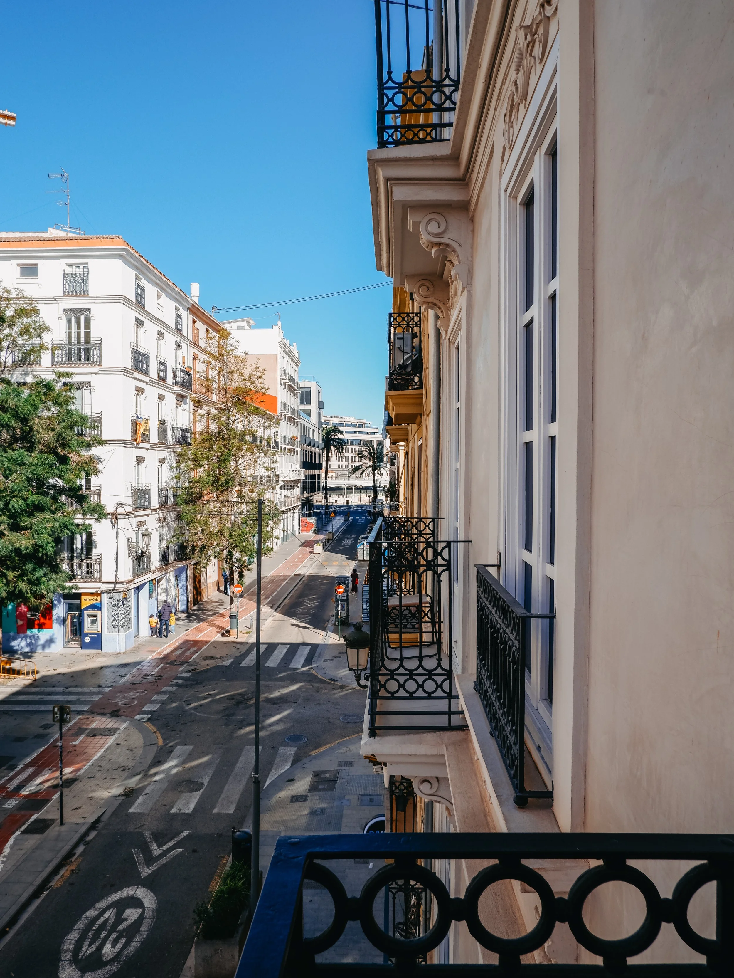 Balcony view overlooking Valencia’s elegant streets lined with historic architecture