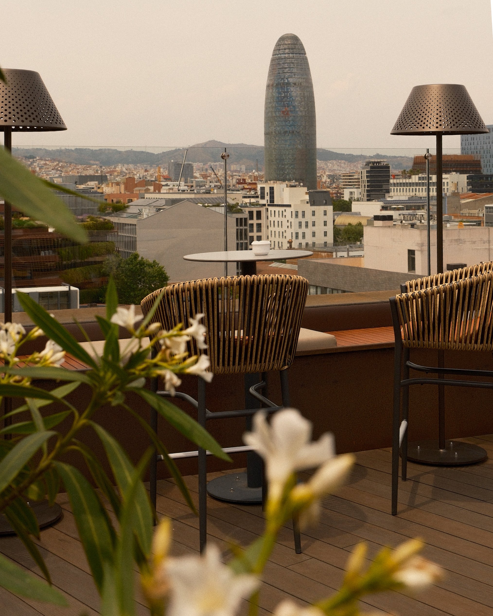 Rooftop terrace overlooking Barcelona’s skyline and Torre Glòries