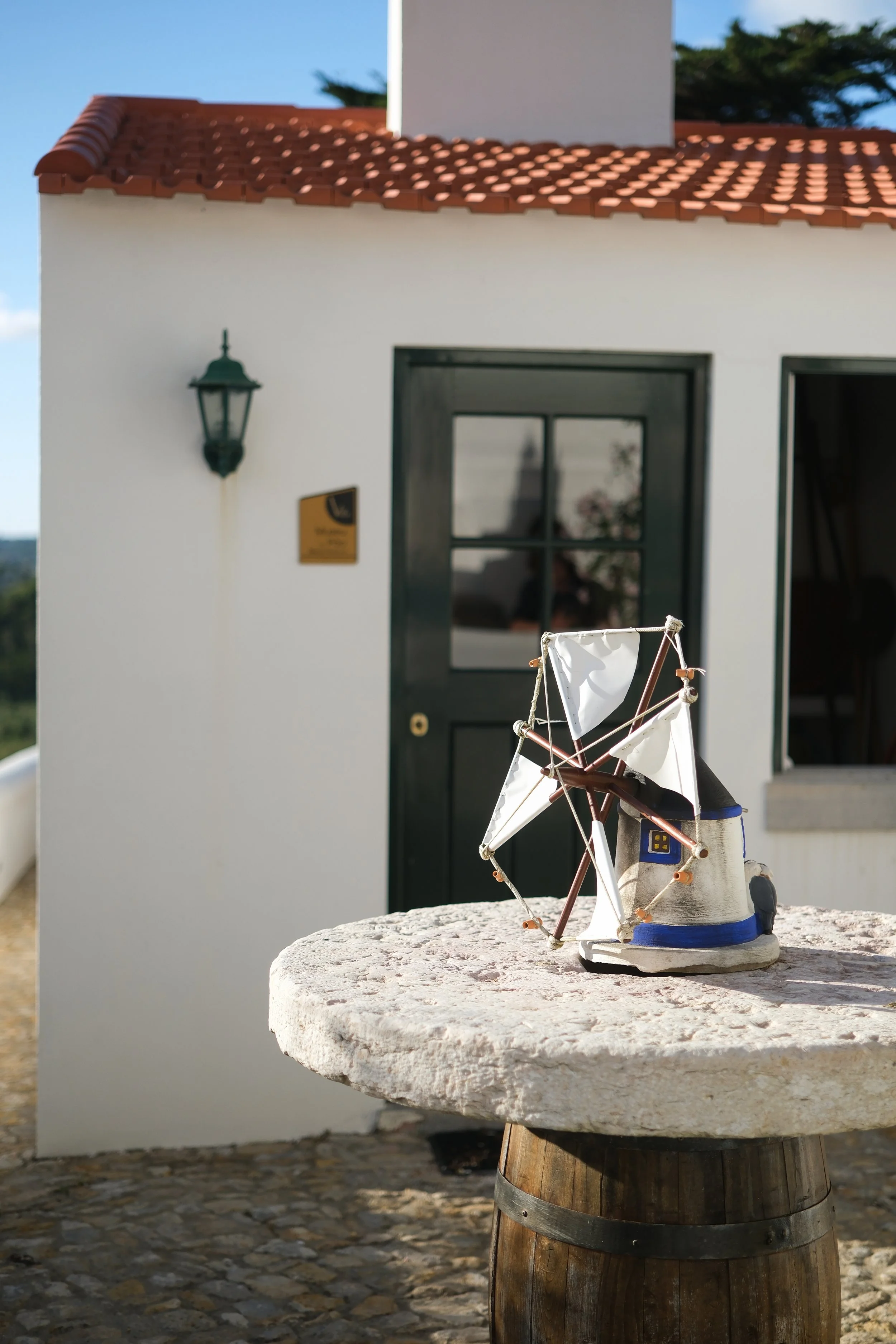 Traditional Portuguese windmill detail at Quinta da Maquia hotel grounds