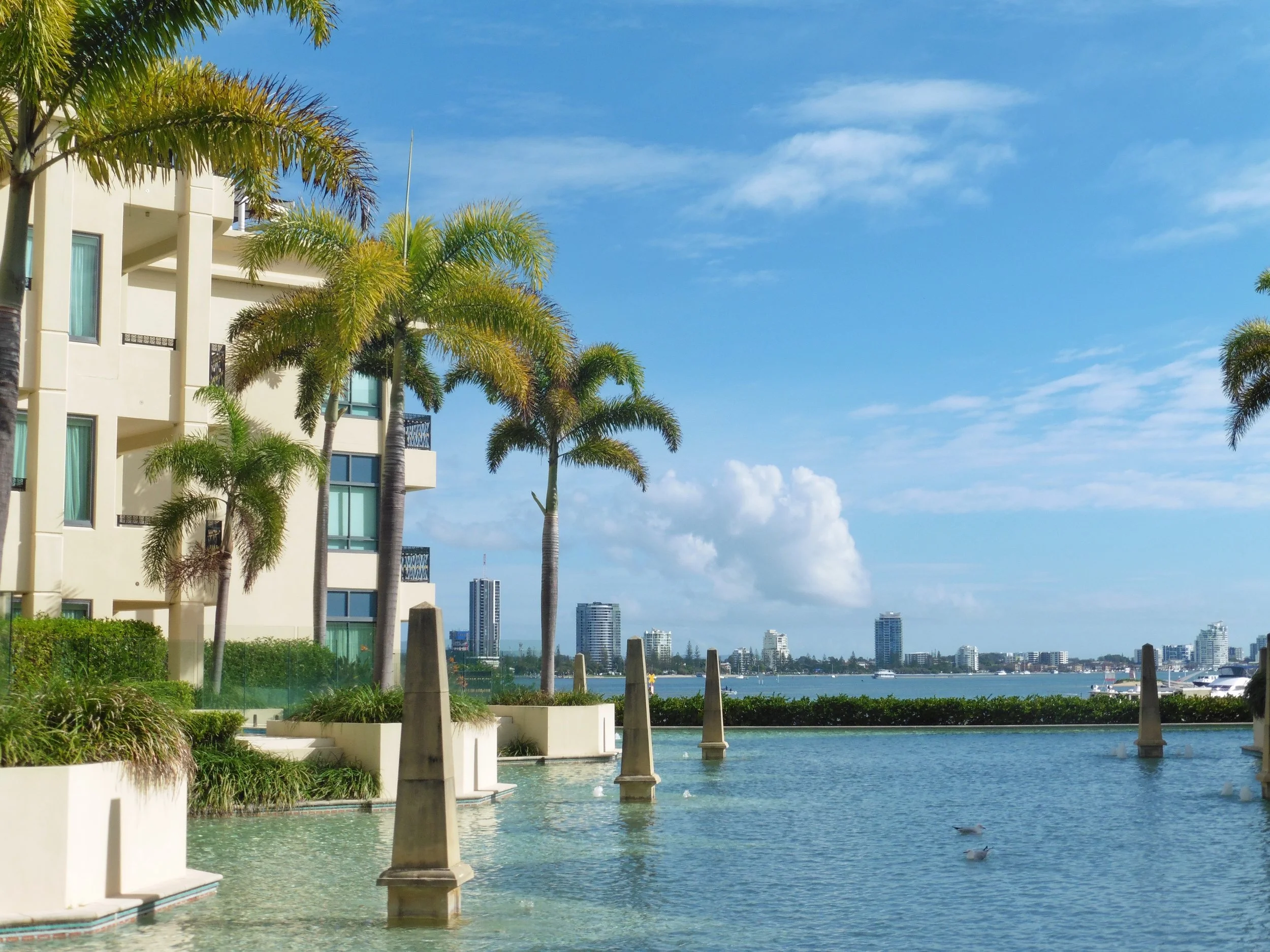 Waterfront infinity-style pool with views across the Gold Coast skyline at Imperial Hotel Gold Coast