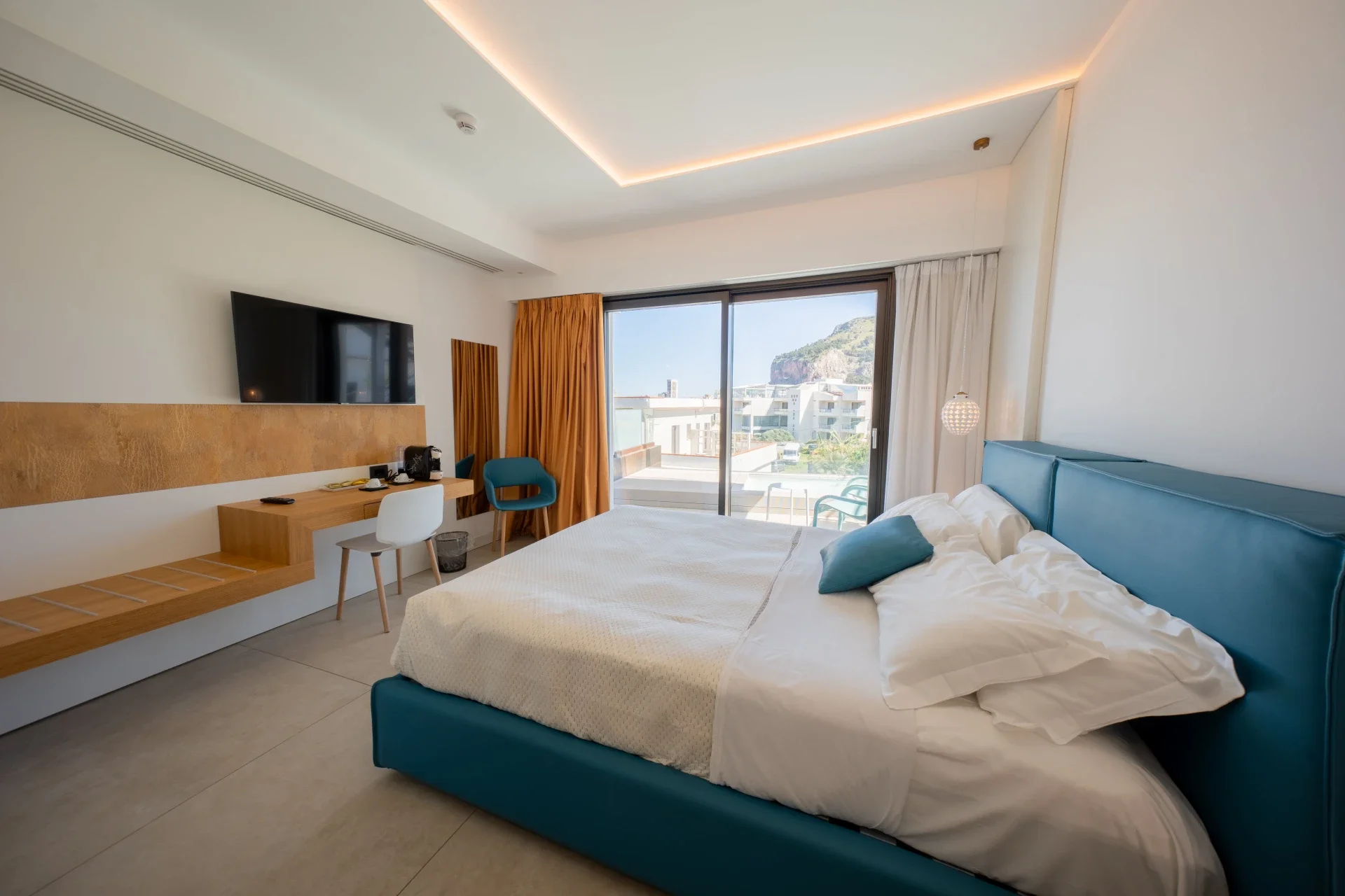 Sea-view bedroom with balcony at Sunset Hotel Cefalù facing Cefalù’s coastline