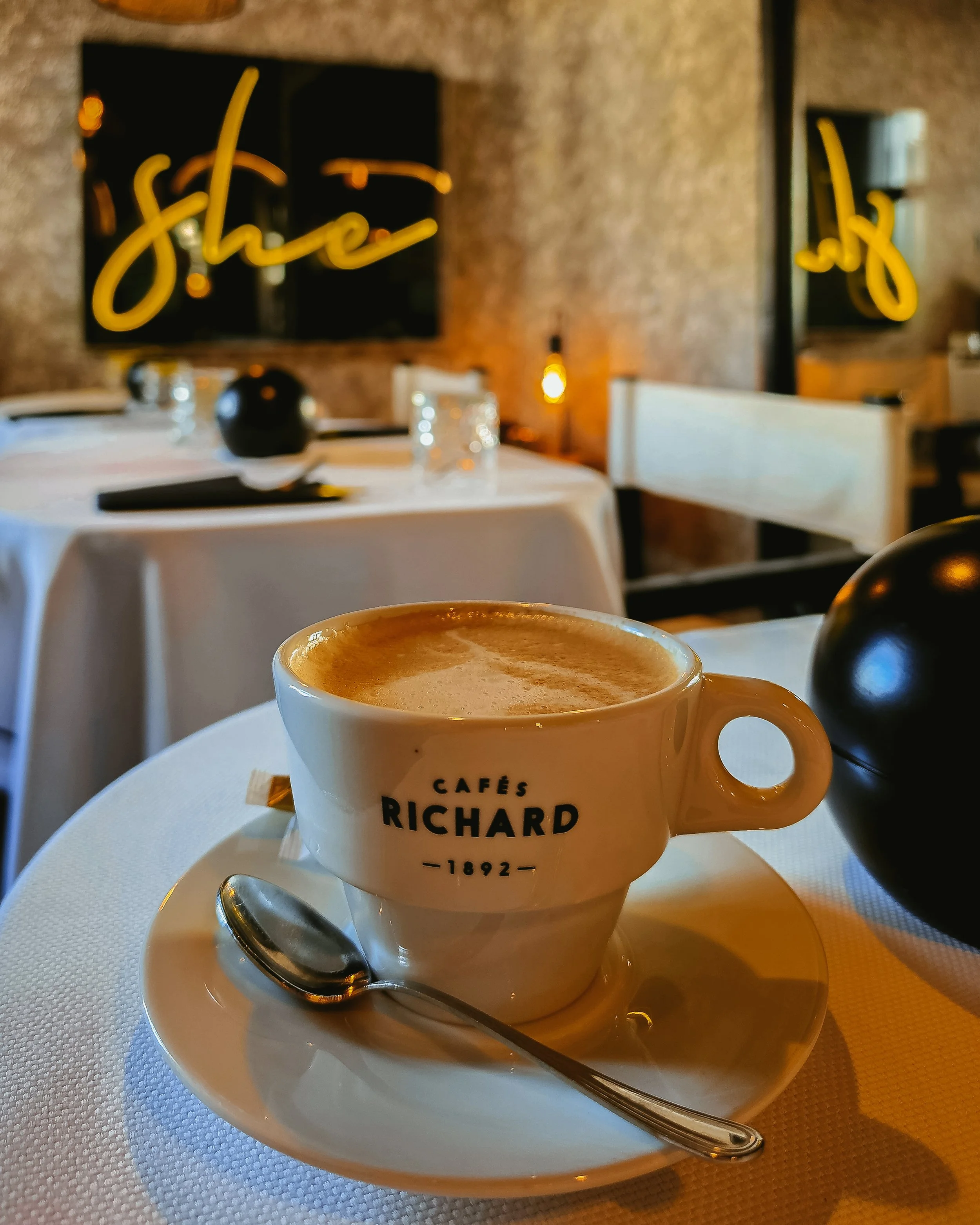 Specialty coffee served in a stylish boutique dining space with elegant contemporary interiors