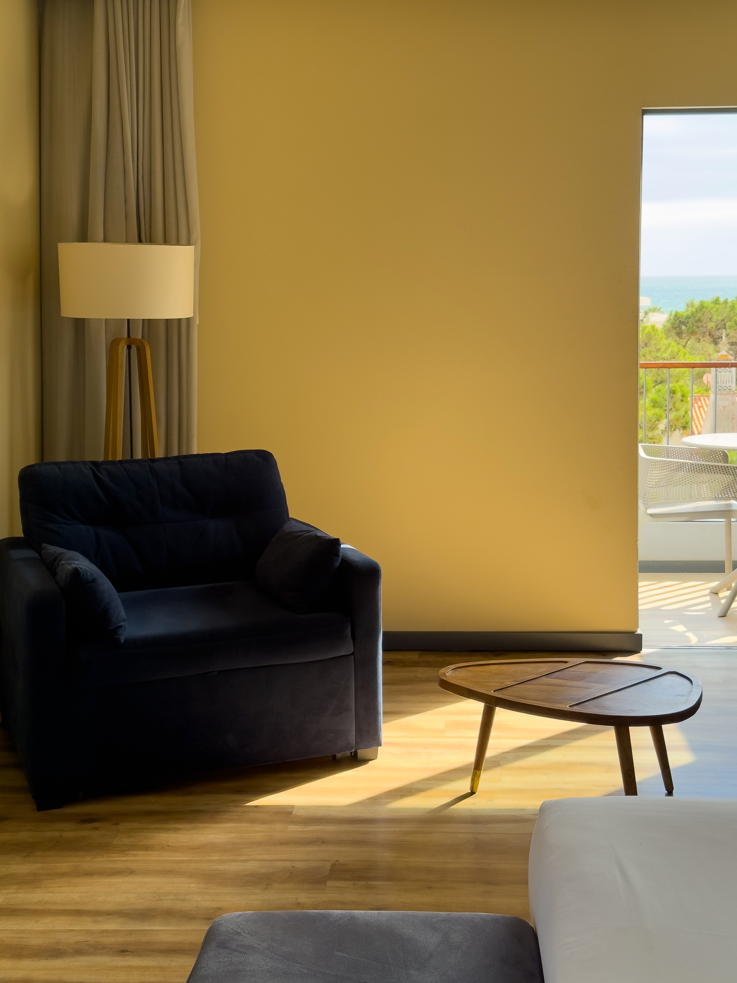 Bright contemporary suite with balcony overlooking the Algarve coastline