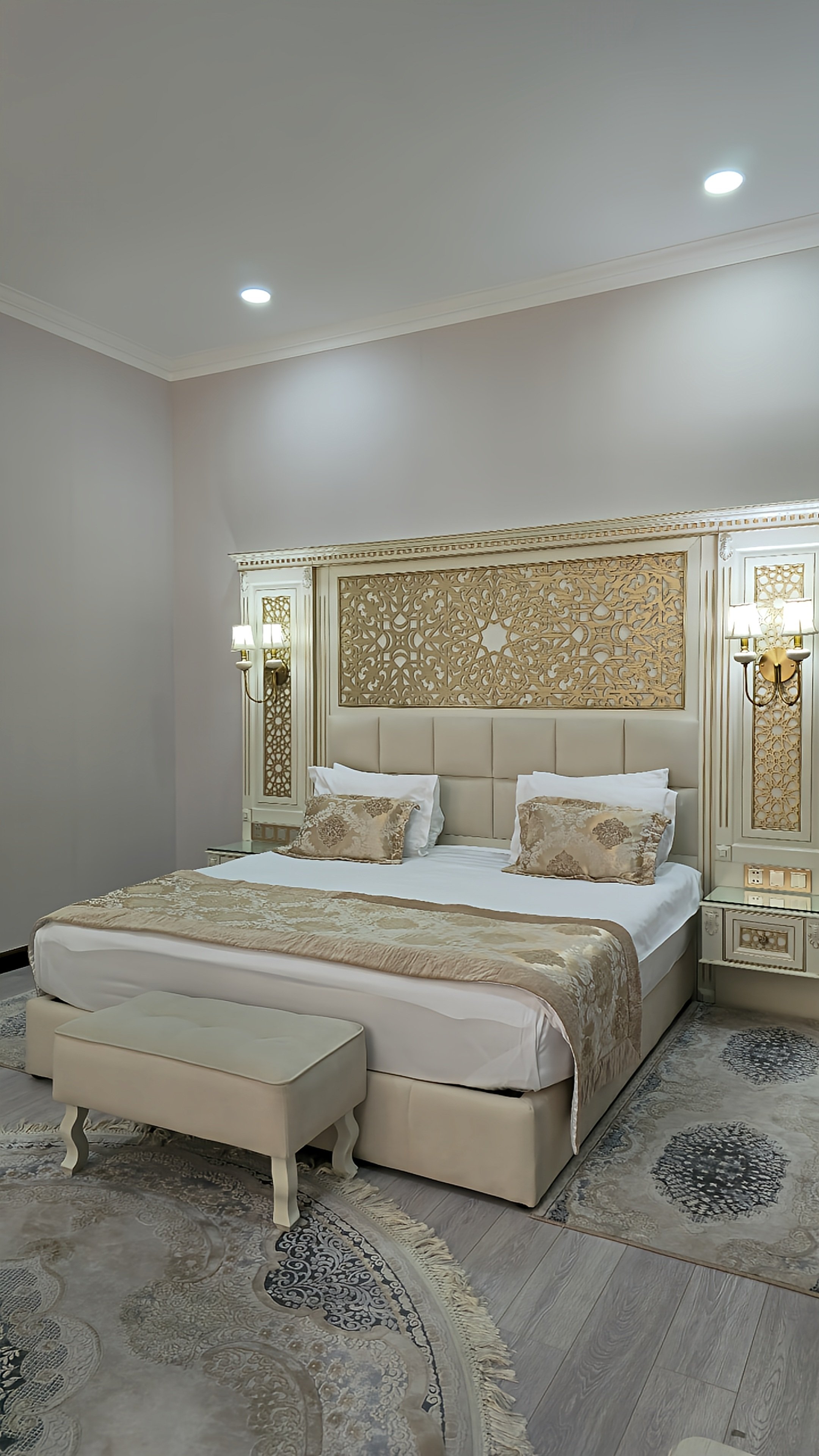 Elegant guest room featuring ornate décor, handcrafted details, and classic luxury interiors