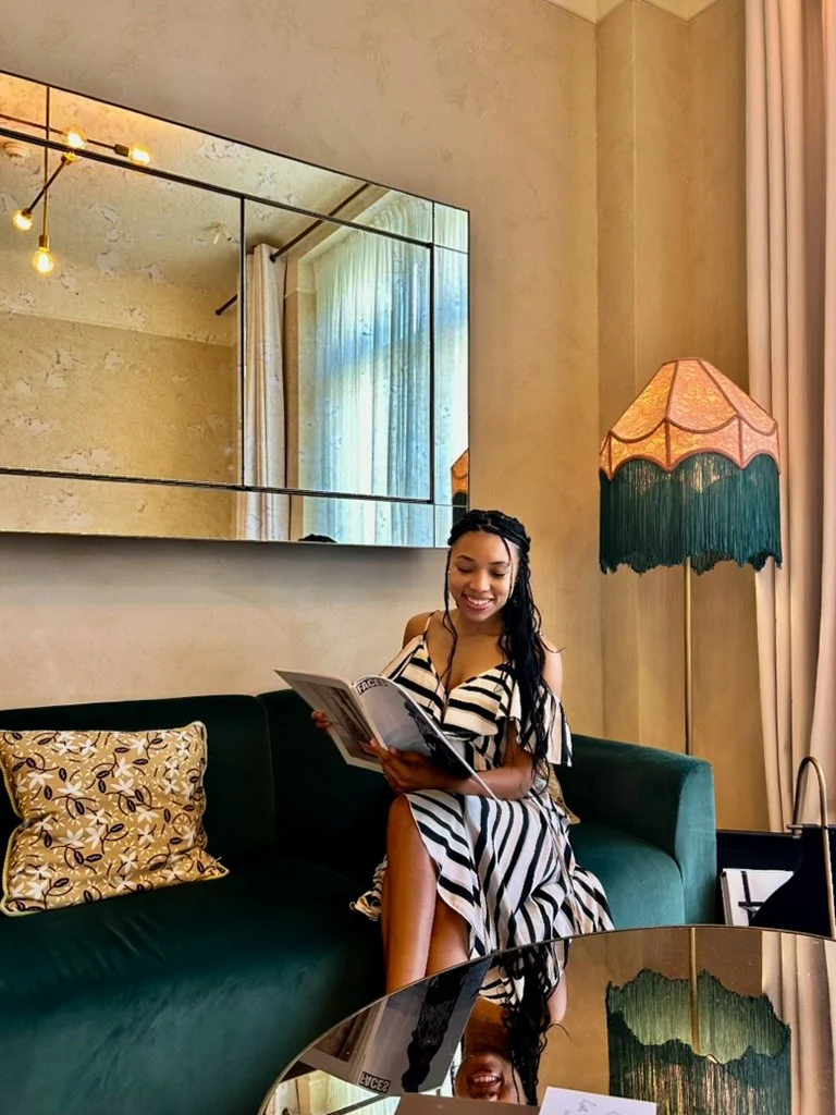 Comfortable seating corner with sophisticated boutique hotel interiors
