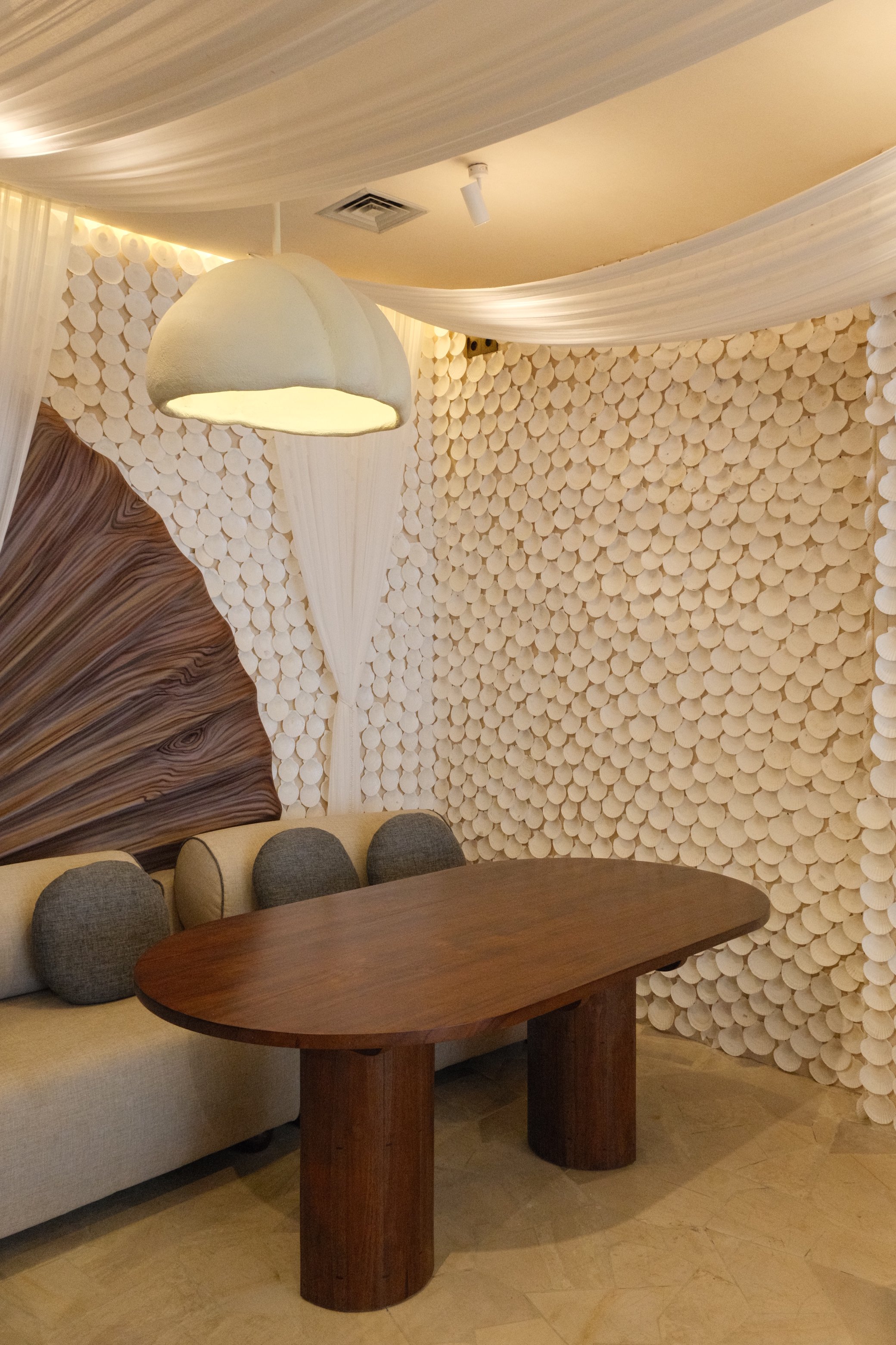 Contemporary dining space with handcrafted décor and warm natural materials
