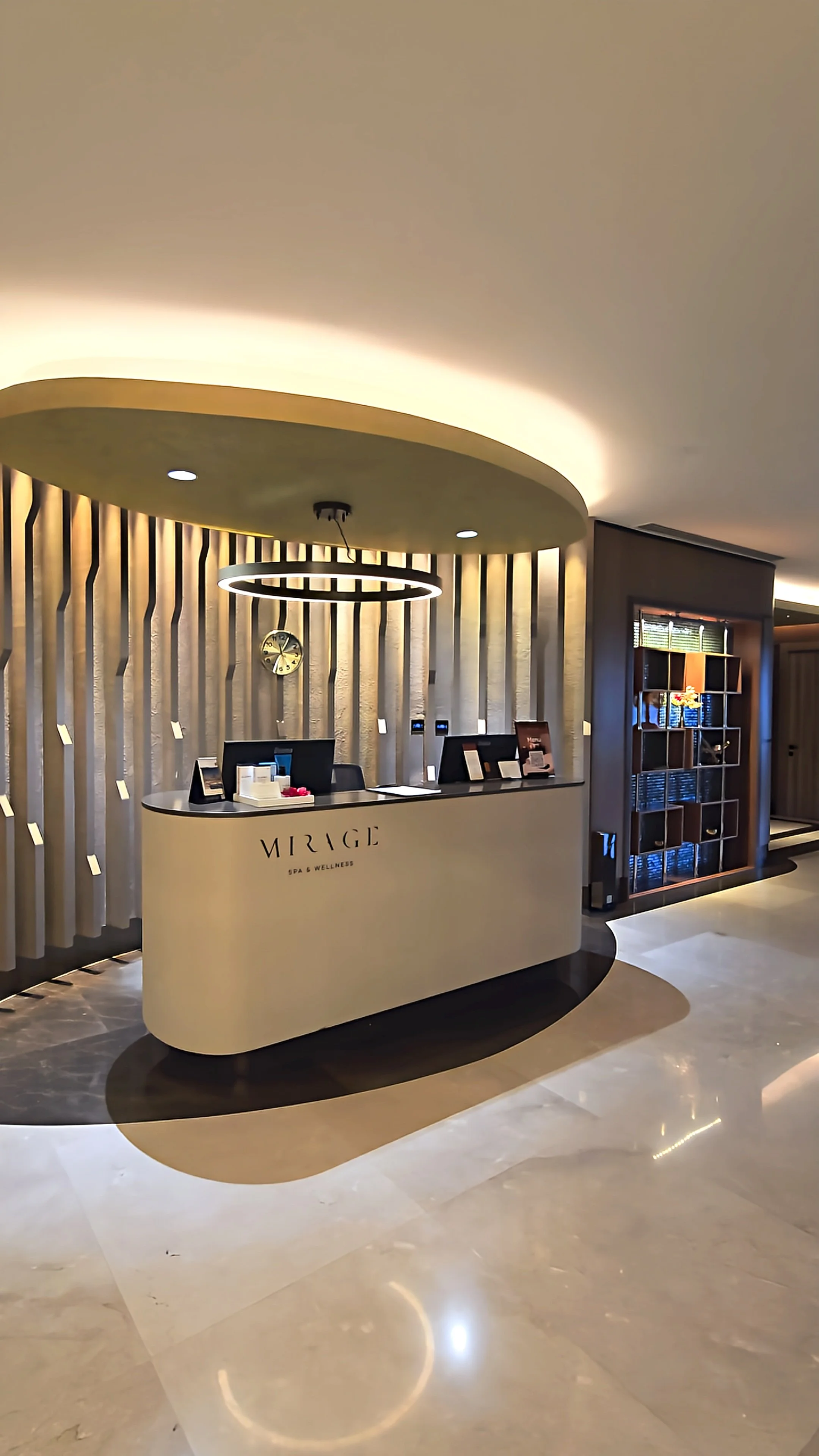 Elegant spa reception welcoming guests with contemporary interiors and a refined wellness atmosphere