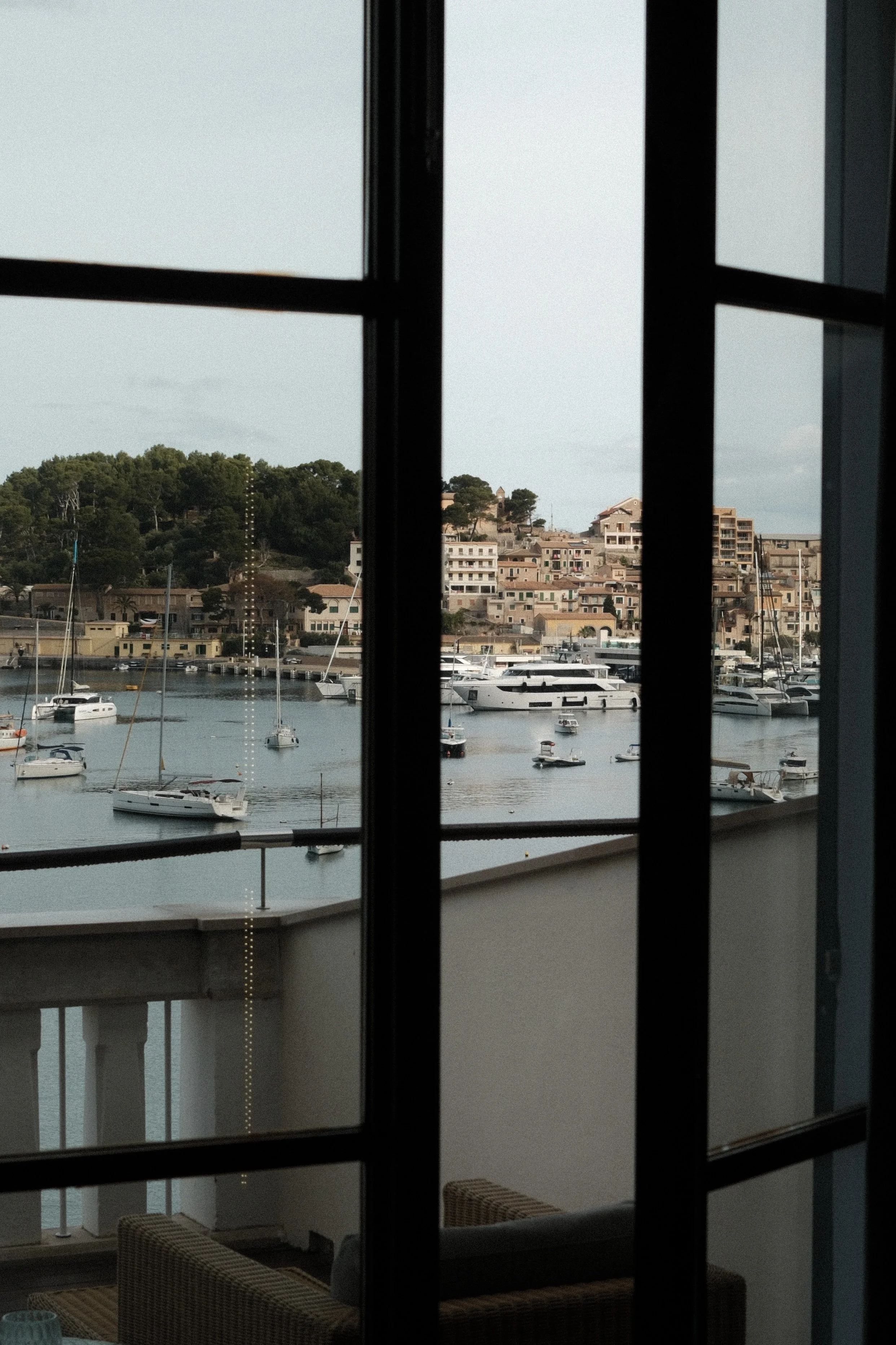 Harbor views framed through the suite windows at Hotel Espléndido in Sóller