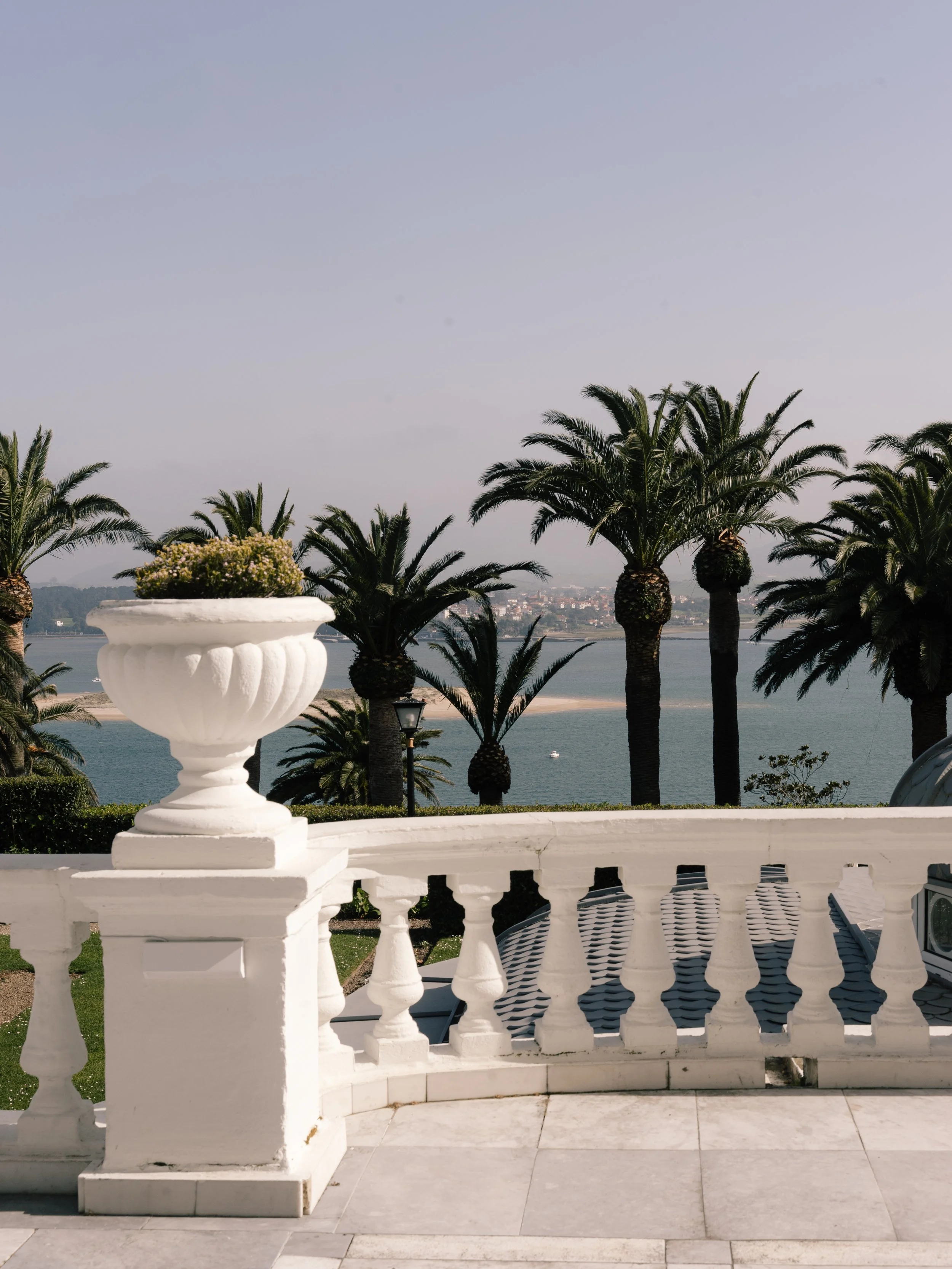 Palm-lined terrace overlooking Santander Bay