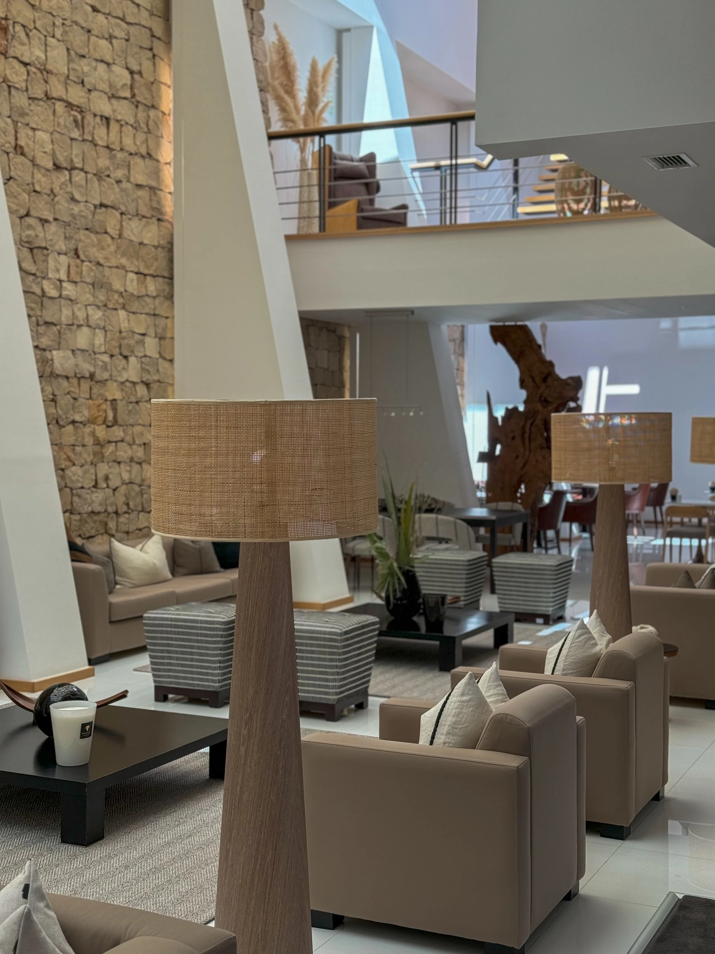 Contemporary lounge with natural stone architecture and refined interiors at Vila Valverde