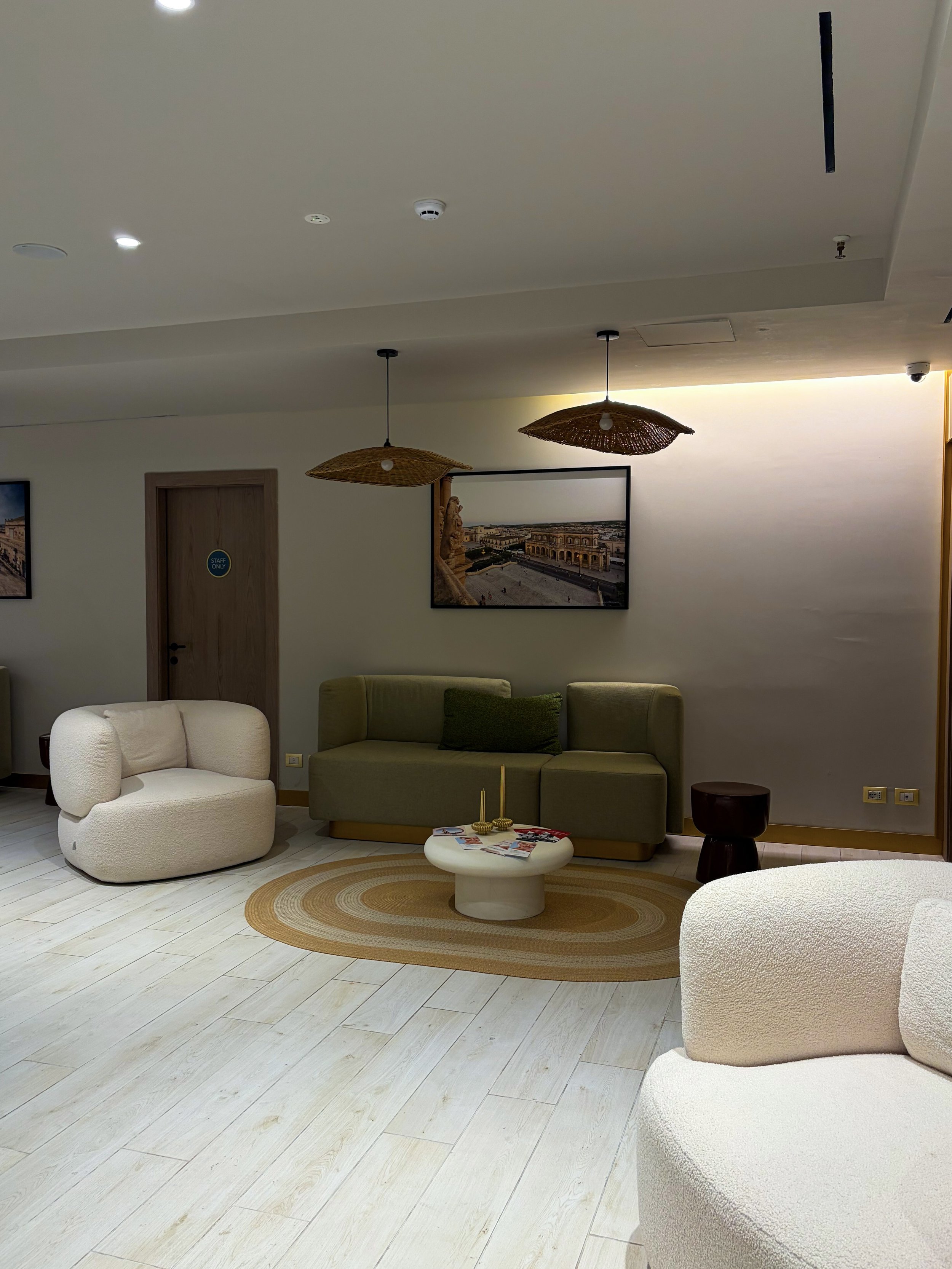 Relaxing lounge area featuring contemporary furnishings and warm natural tones