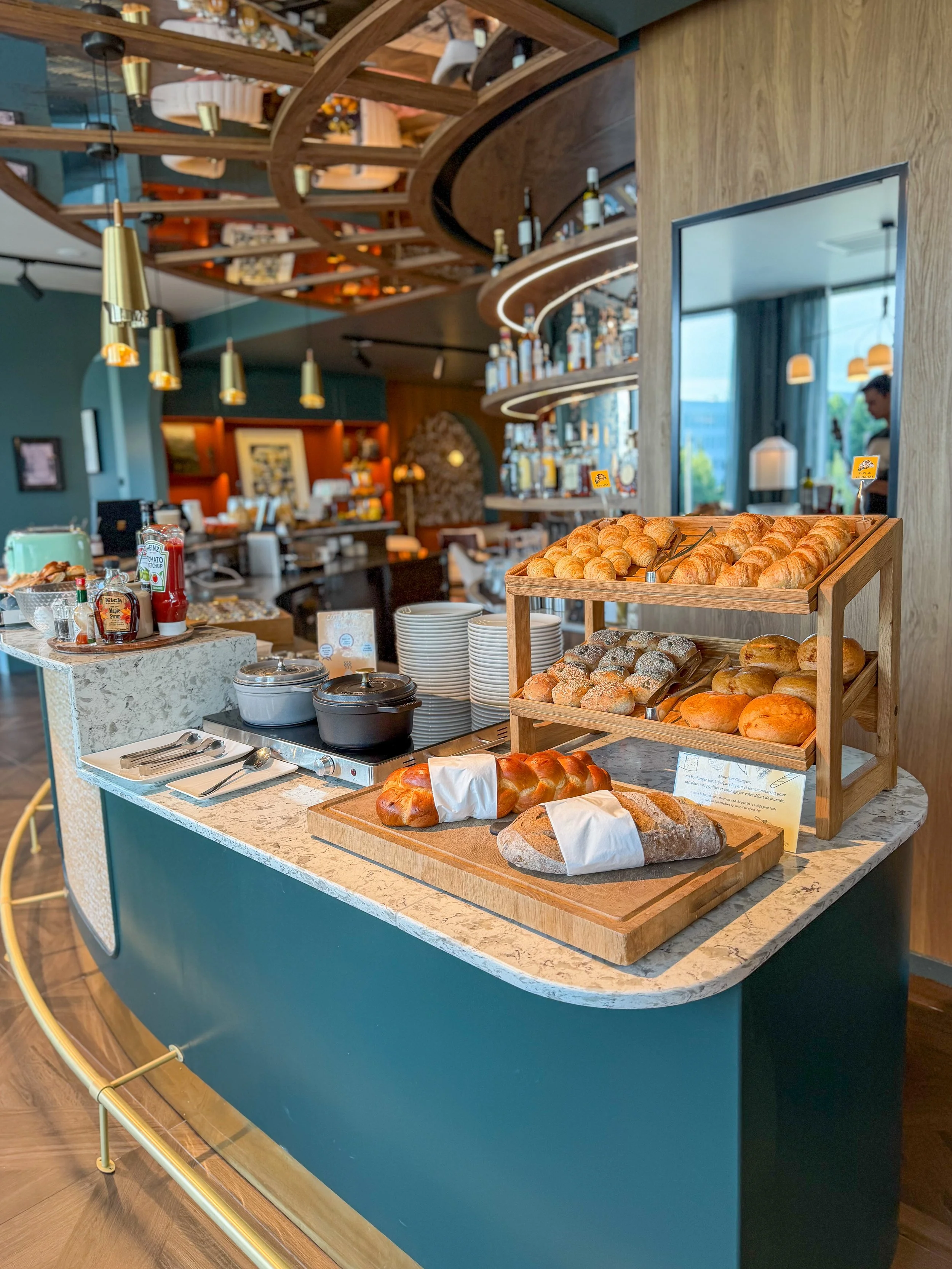 Freshly baked pastries and artisan breads displayed at the generous breakfast buffet