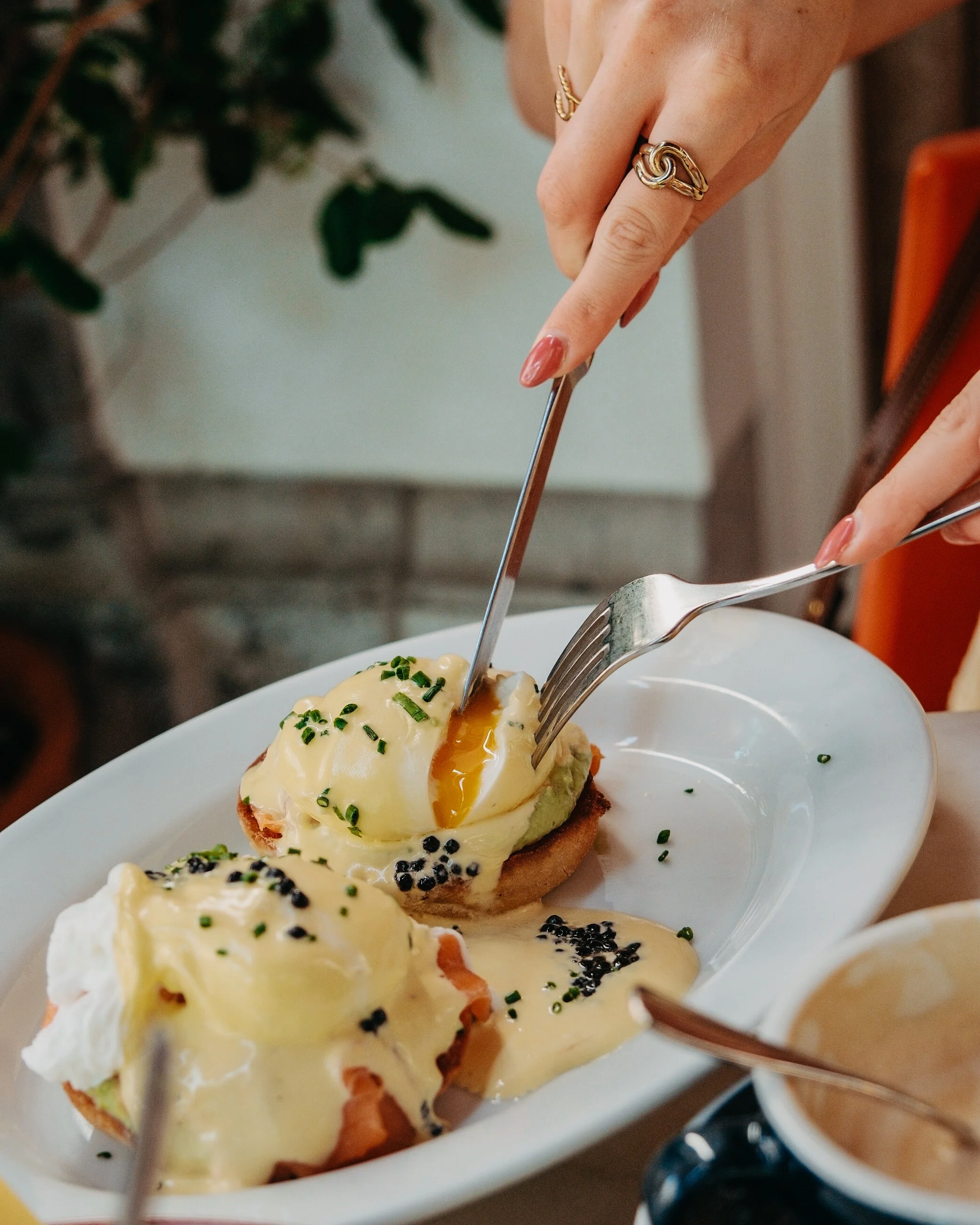Fresh eggs Benedict served with creamy hollandaise for a leisurely breakfast experience
