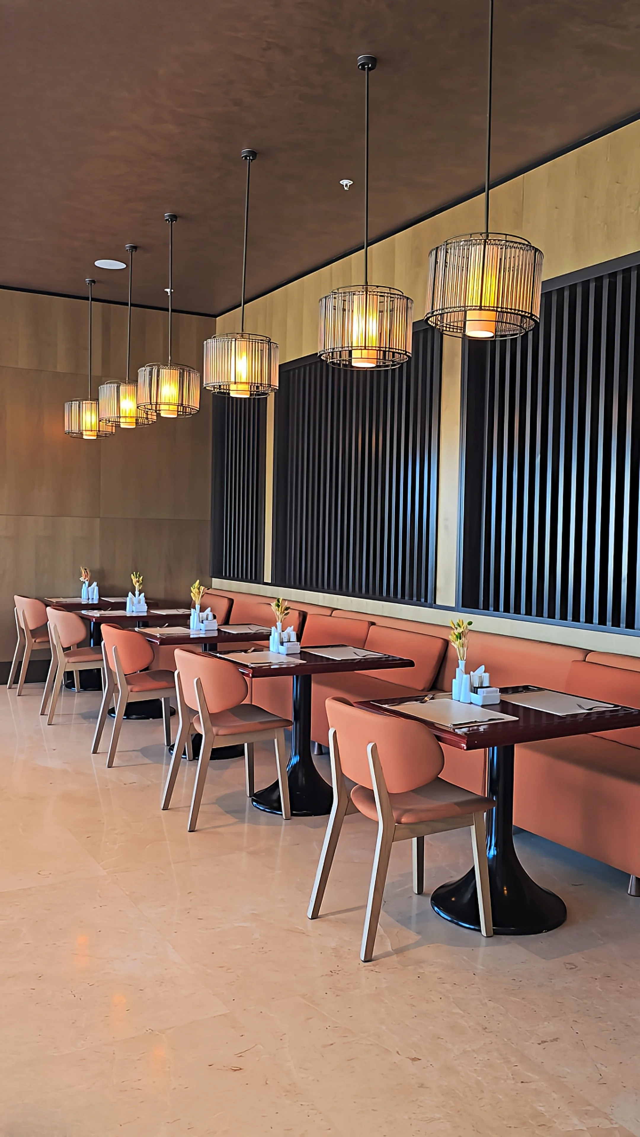 Sophisticated restaurant with warm lighting, modern furnishings and elegant dining spaces at Silk Road by Minyoun Hotel, Uzbekistan