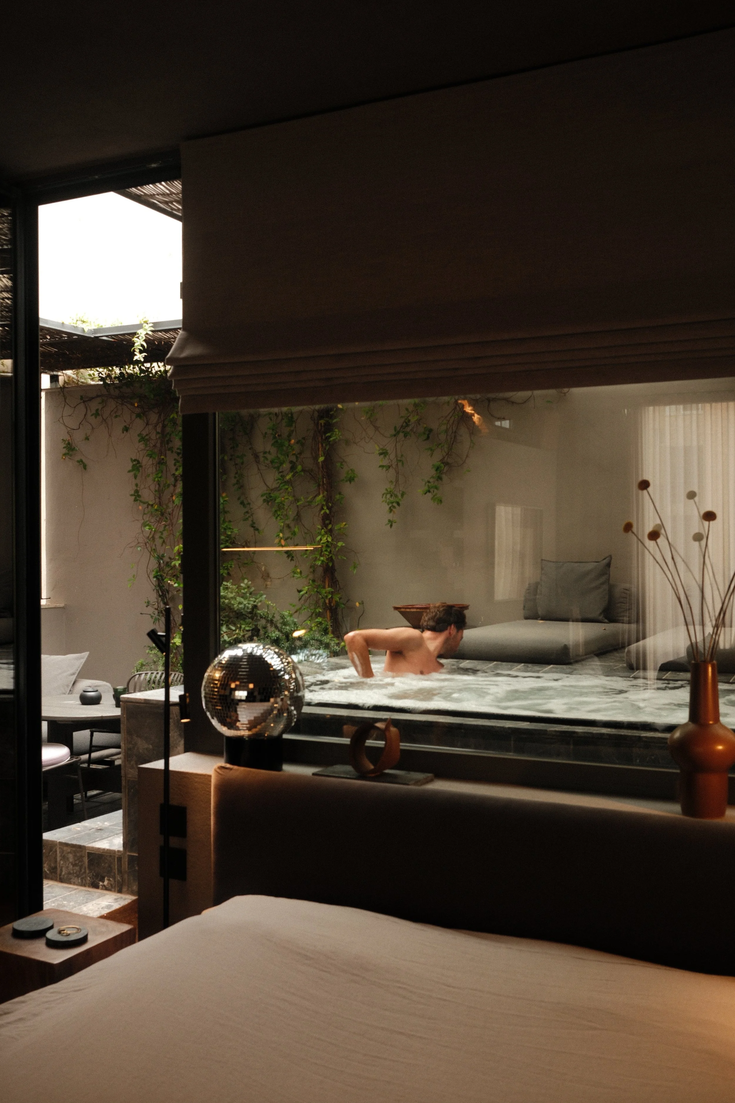 Private plunge pool beside the bedroom with a secluded courtyard and contemporary design