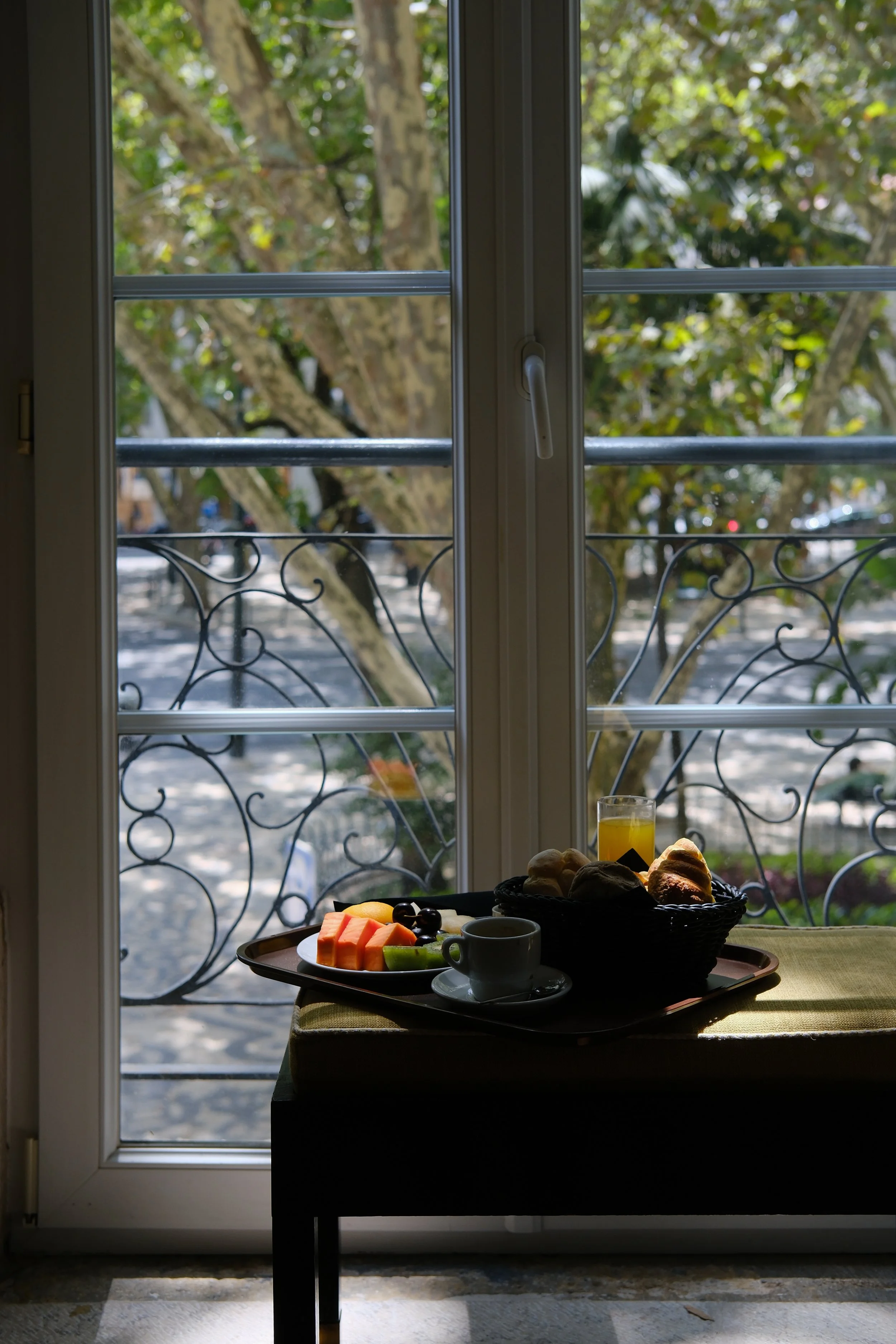 Breakfast tray served beside the window overlooking Avenida da Liberdade
