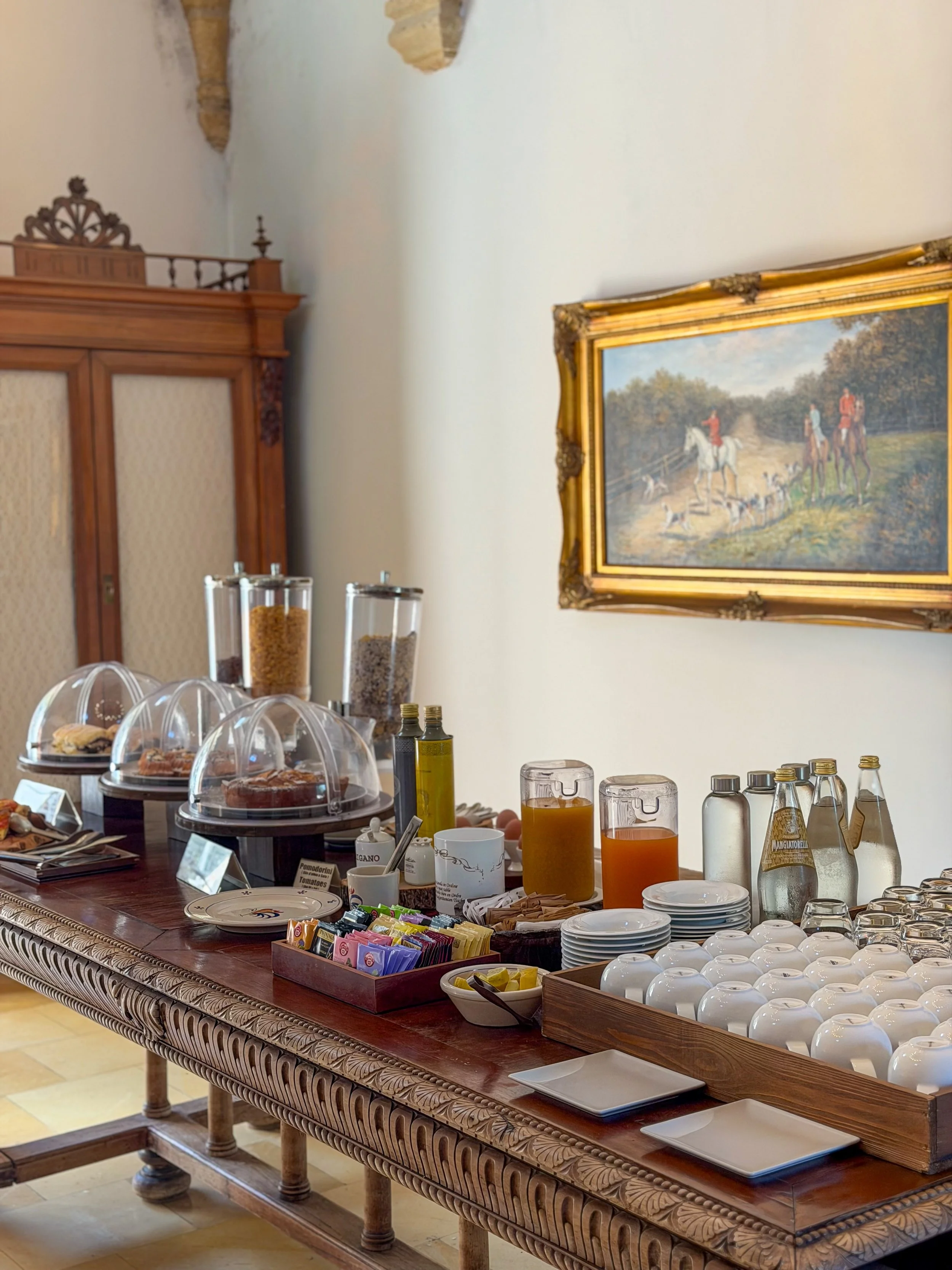Breakfast buffet with local pastries, fresh juices and regional specialties at Tenuta Monacelli Lecce