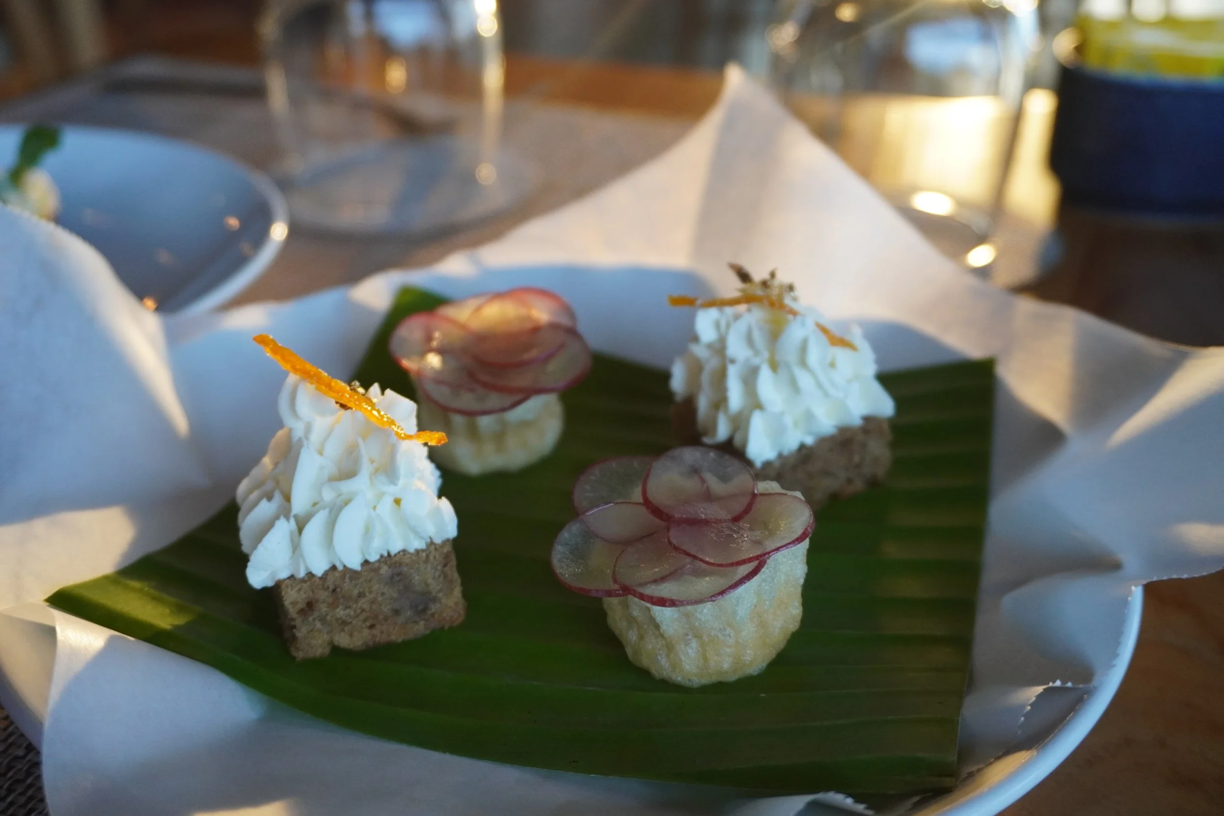 Beautifully presented Indonesian welcome bites served in an elegant dining setting