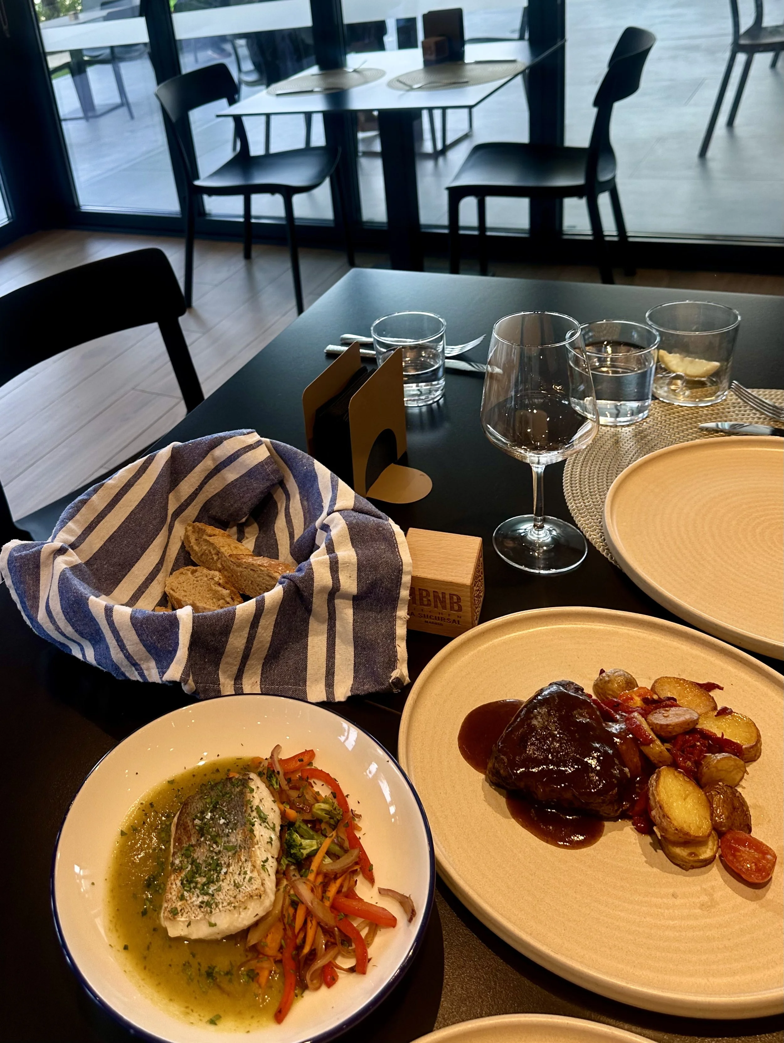 Restaurant serving Mediterranean-inspired cuisine in a bright contemporary setting