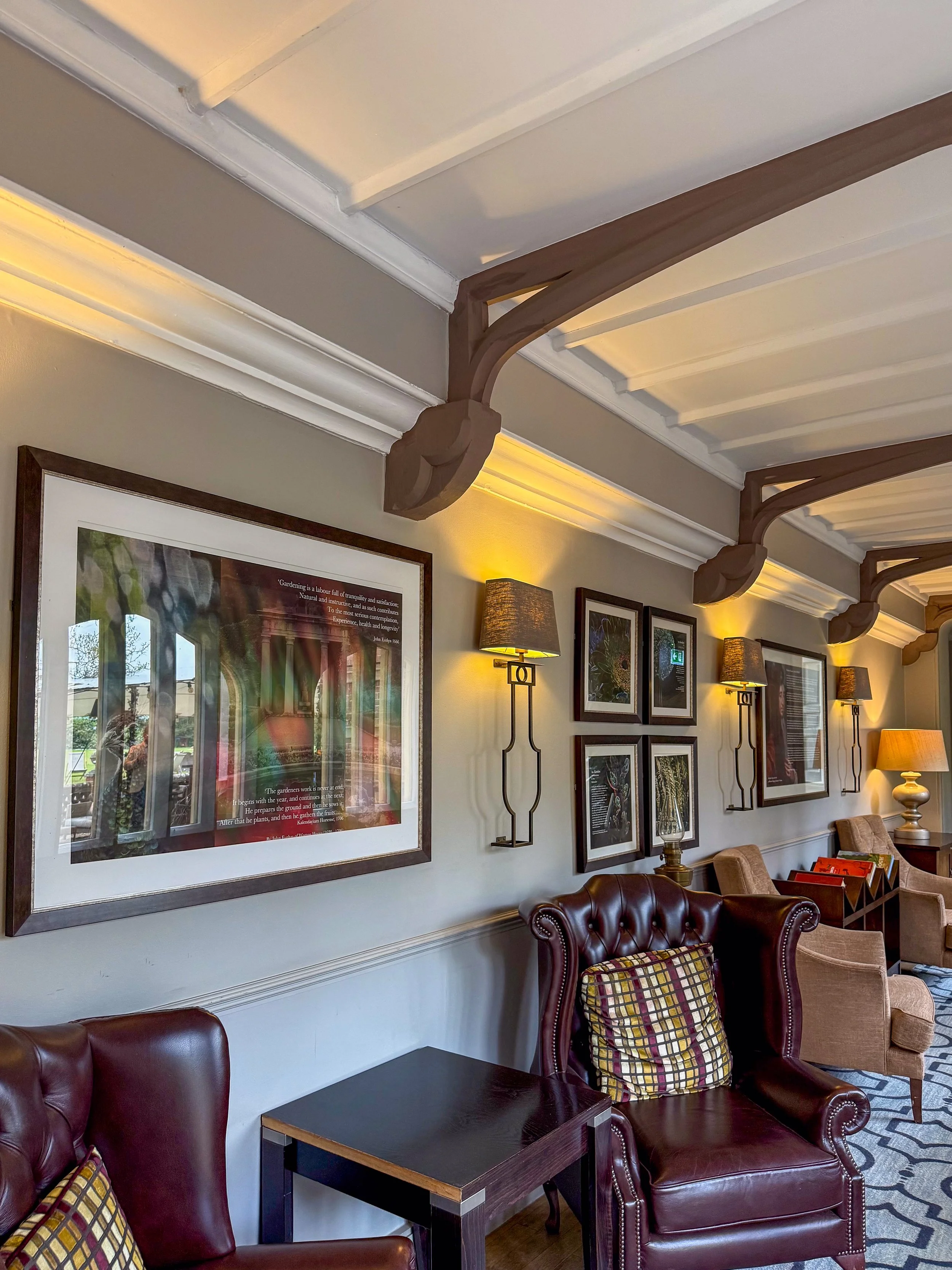 Comfortable lounge with leather armchairs and traditional English country house character