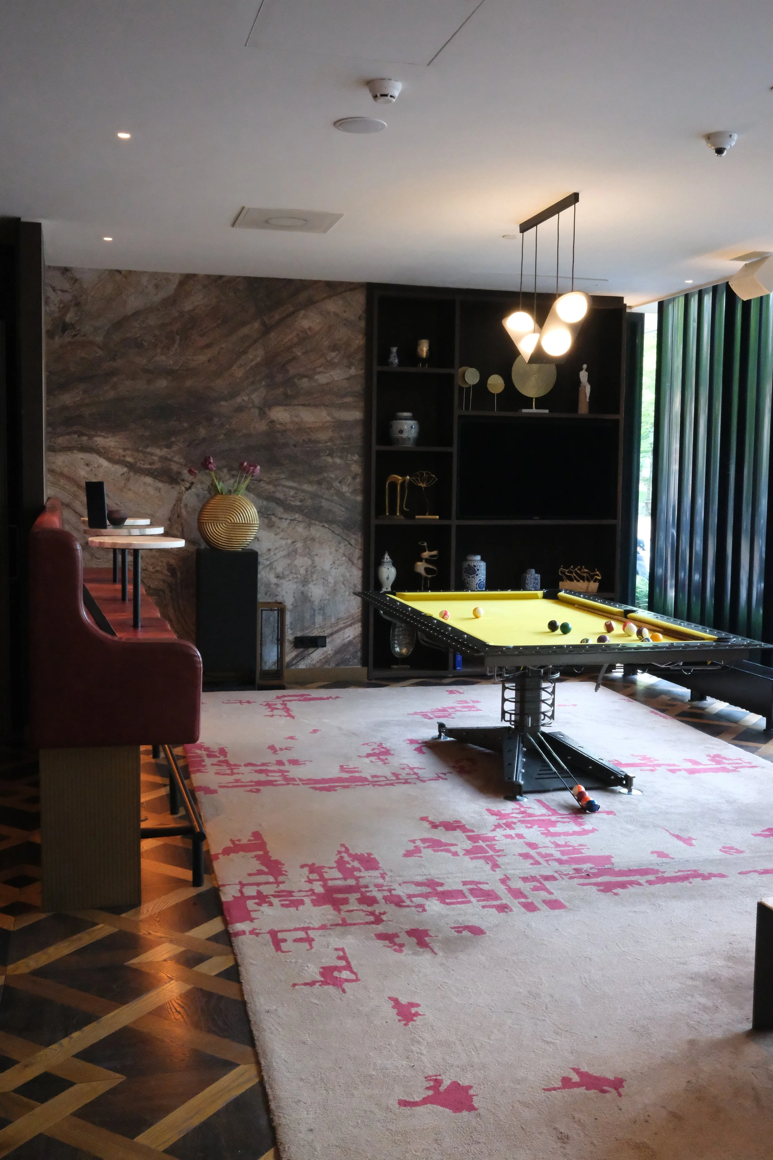 Stylish games lounge with designer interiors and a contemporary billiards table