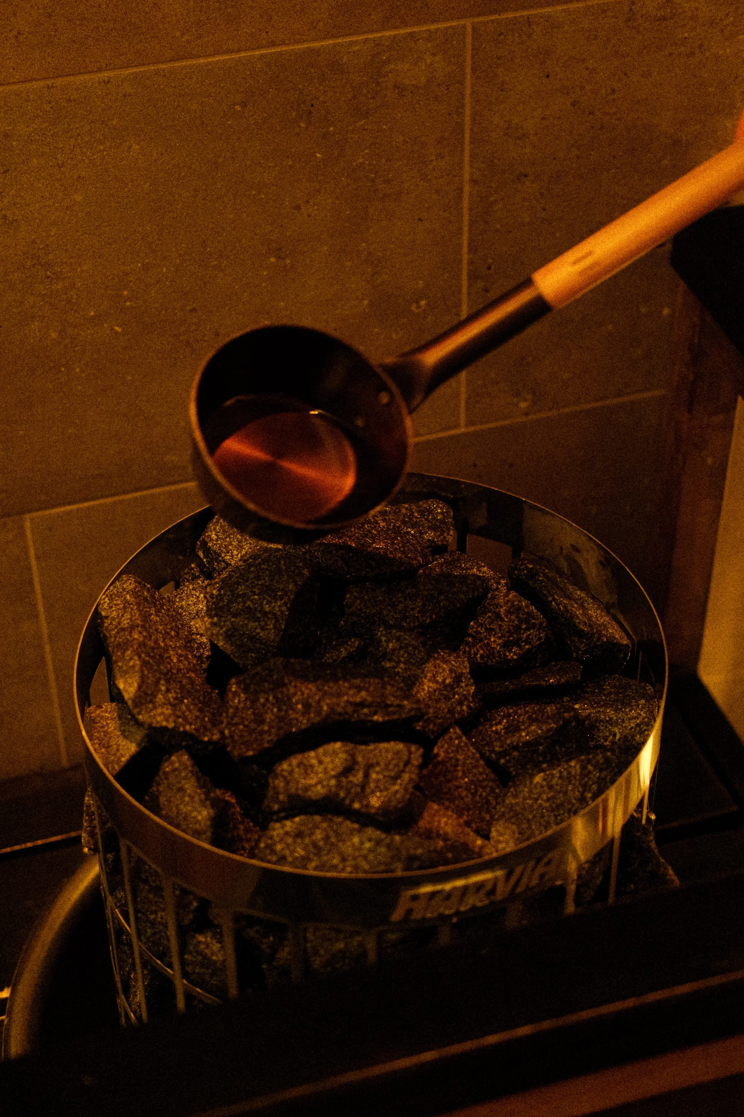 Traditional Finnish sauna with hot stones ready for relaxation