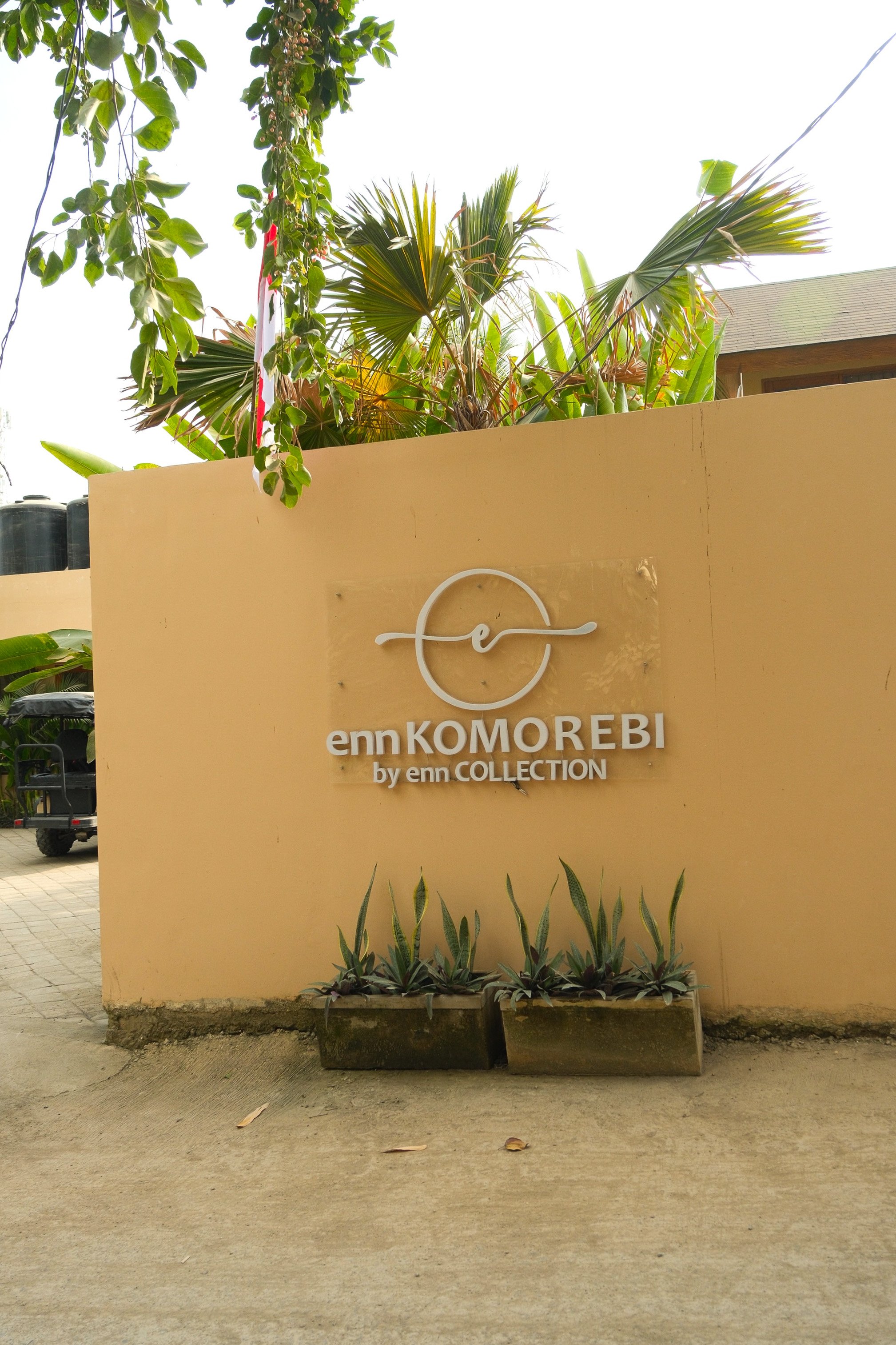 Boutique hotel entrance surrounded by tropical gardens in Lombok