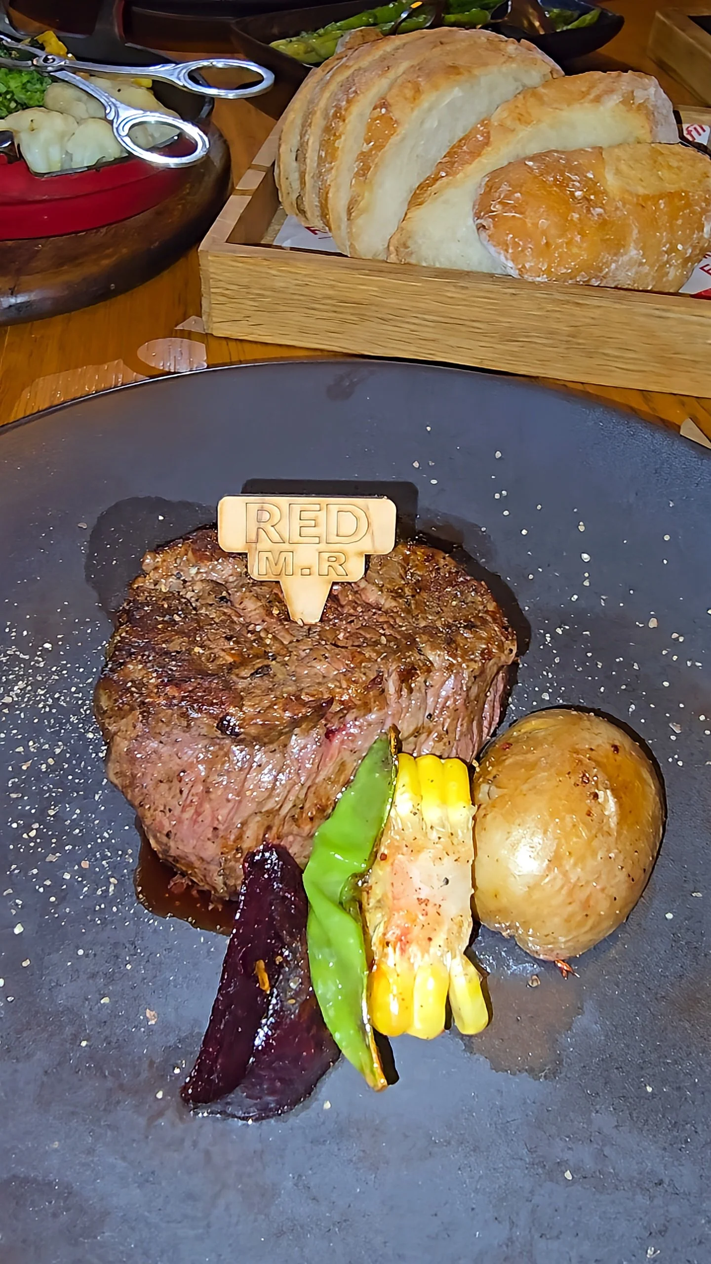 Premium steak dish with grilled vegetables and fresh bread served at the resort’s signature restaurant, Hyatt Regency Aqaba Ayla Resort – Aqaba, Jordan.