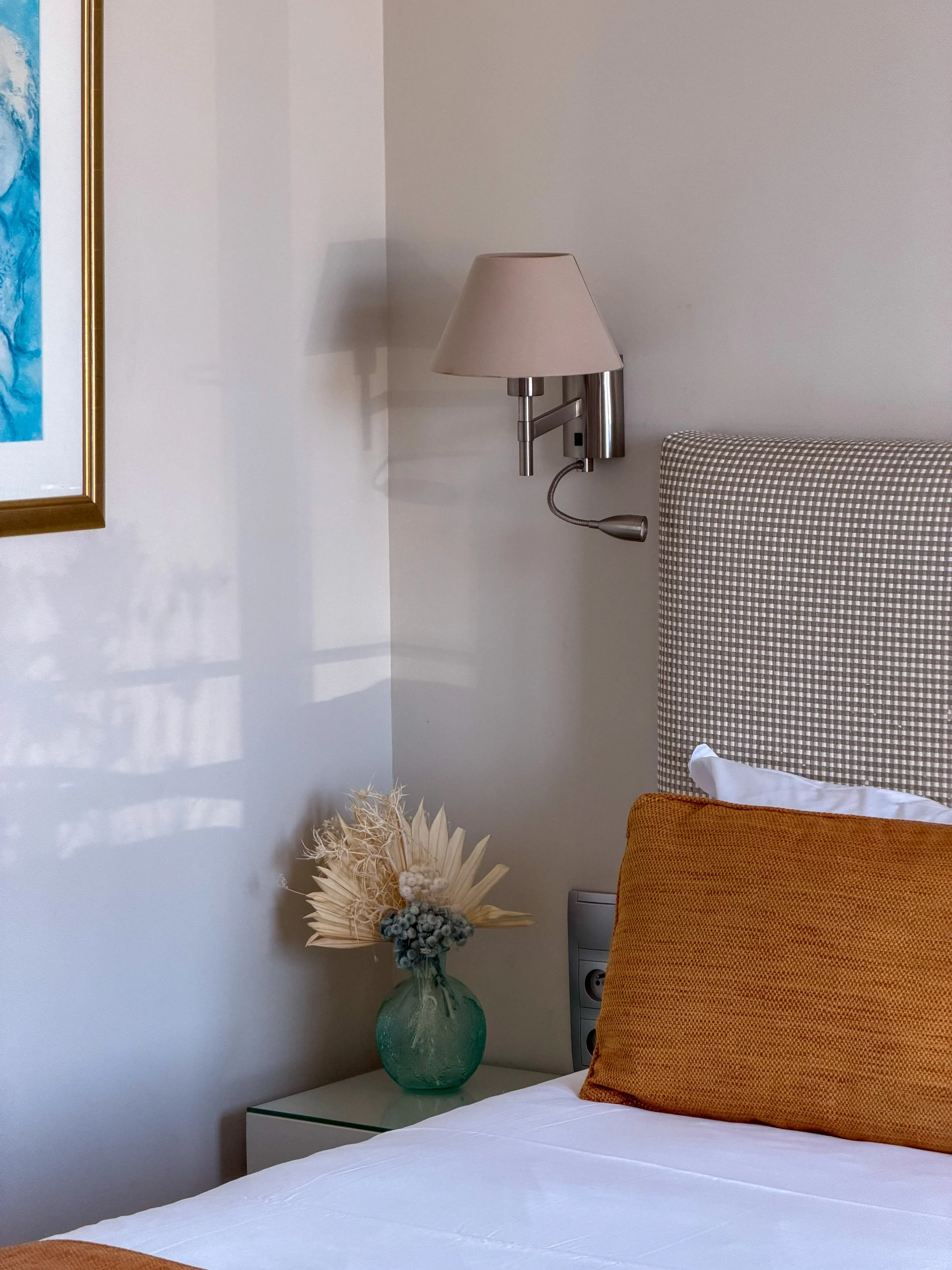 Thoughtful bedside details creating a warm and inviting atmosphere