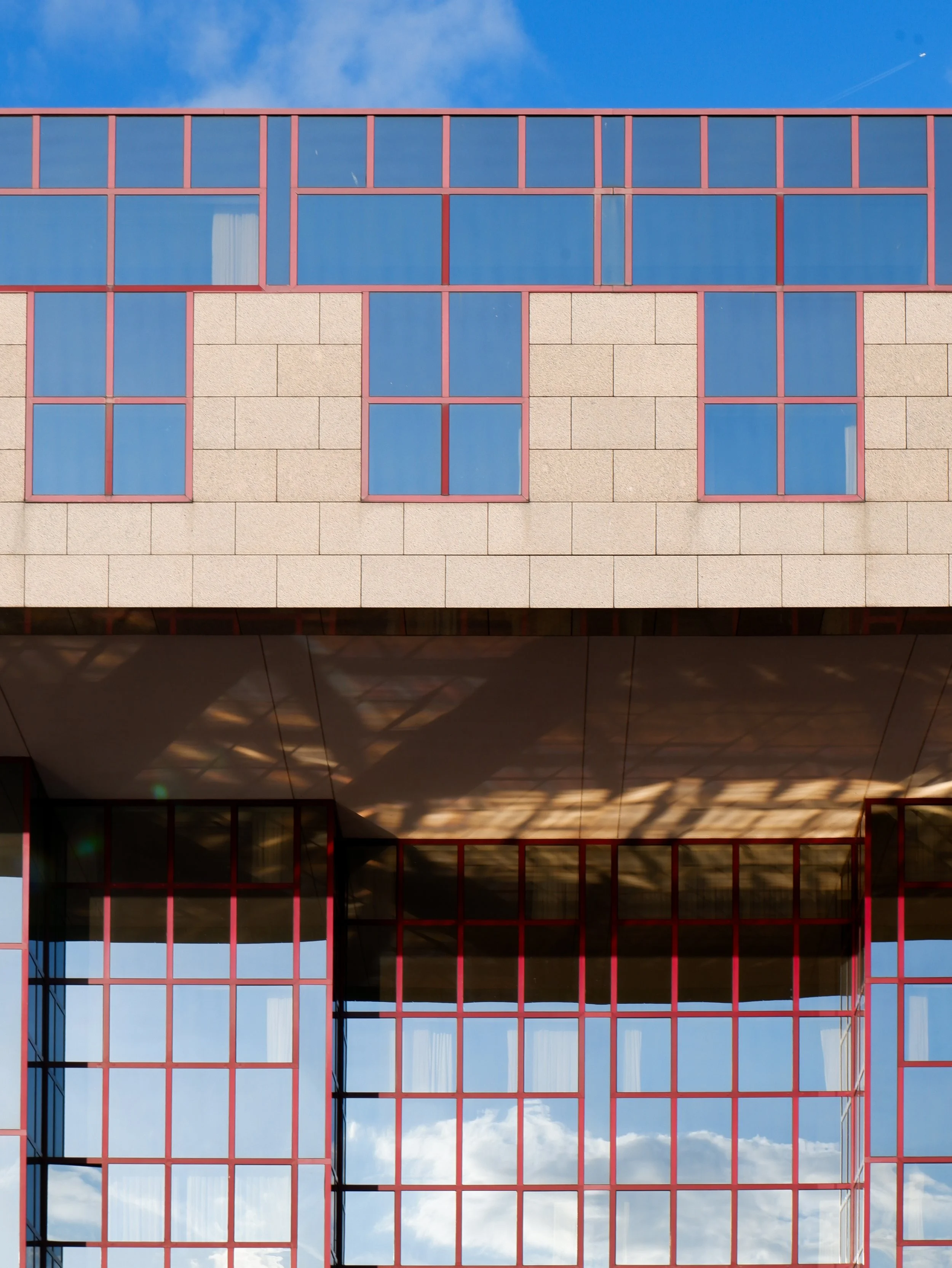 Modern hotel façade with distinctive architecture overlooking the Rhine waterfront in Cologne
