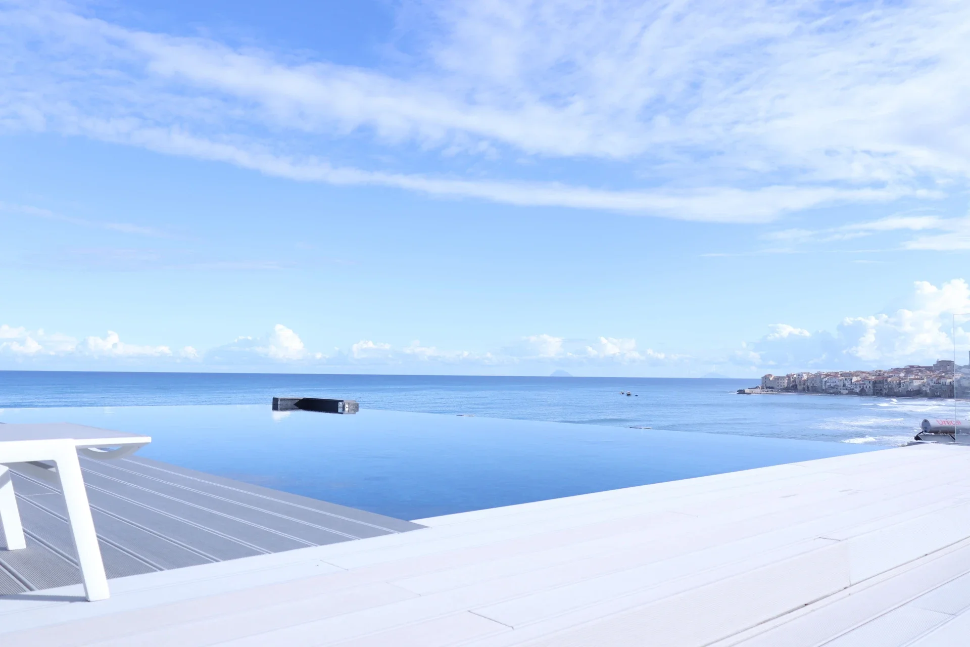 Infinity pool at Sunset Hotel Cefalù overlooking the sea and sky