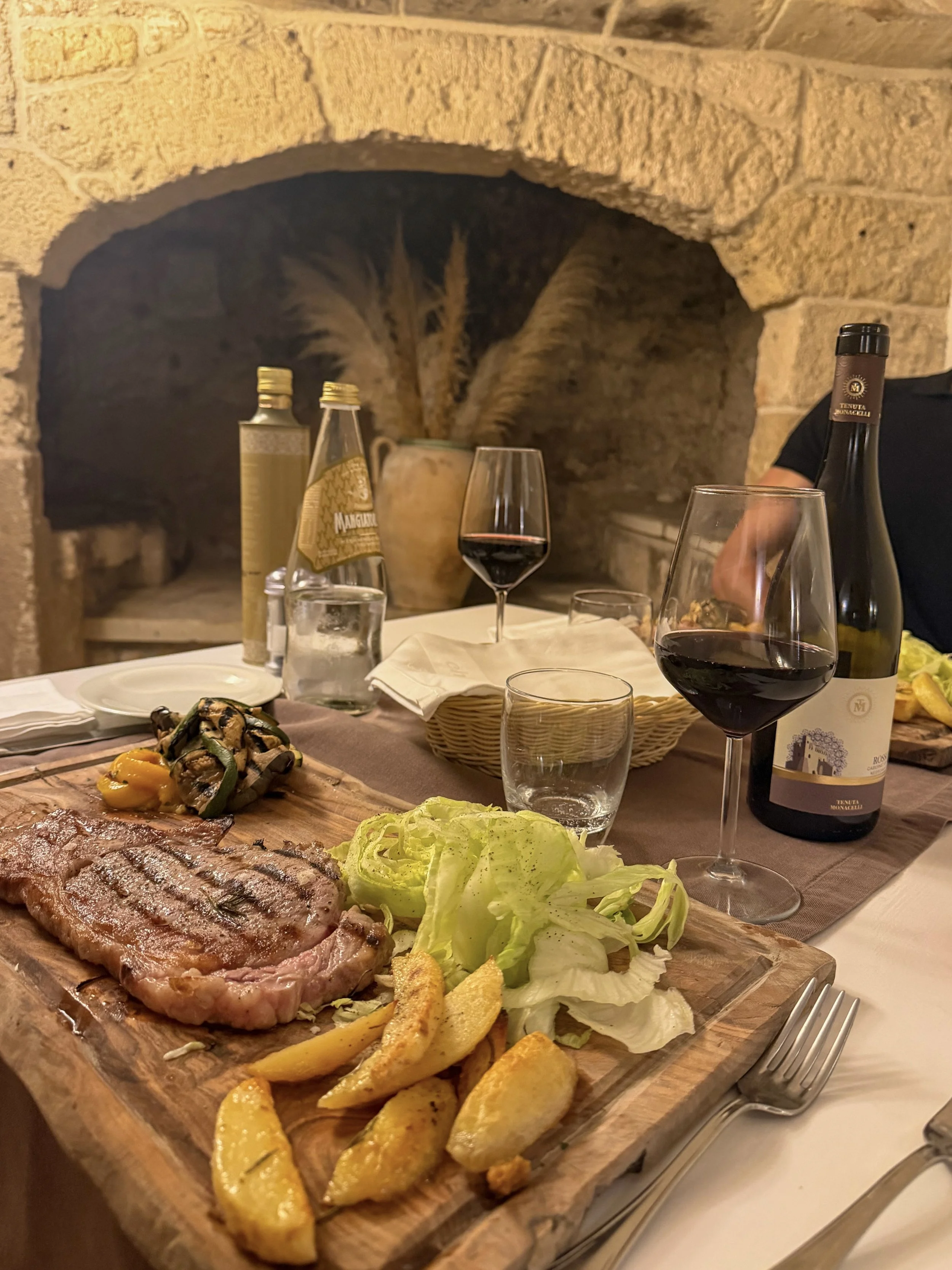 Traditional dining experience featuring local wine and authentic Apulian cuisine at Tenuta Monacelli Lecce