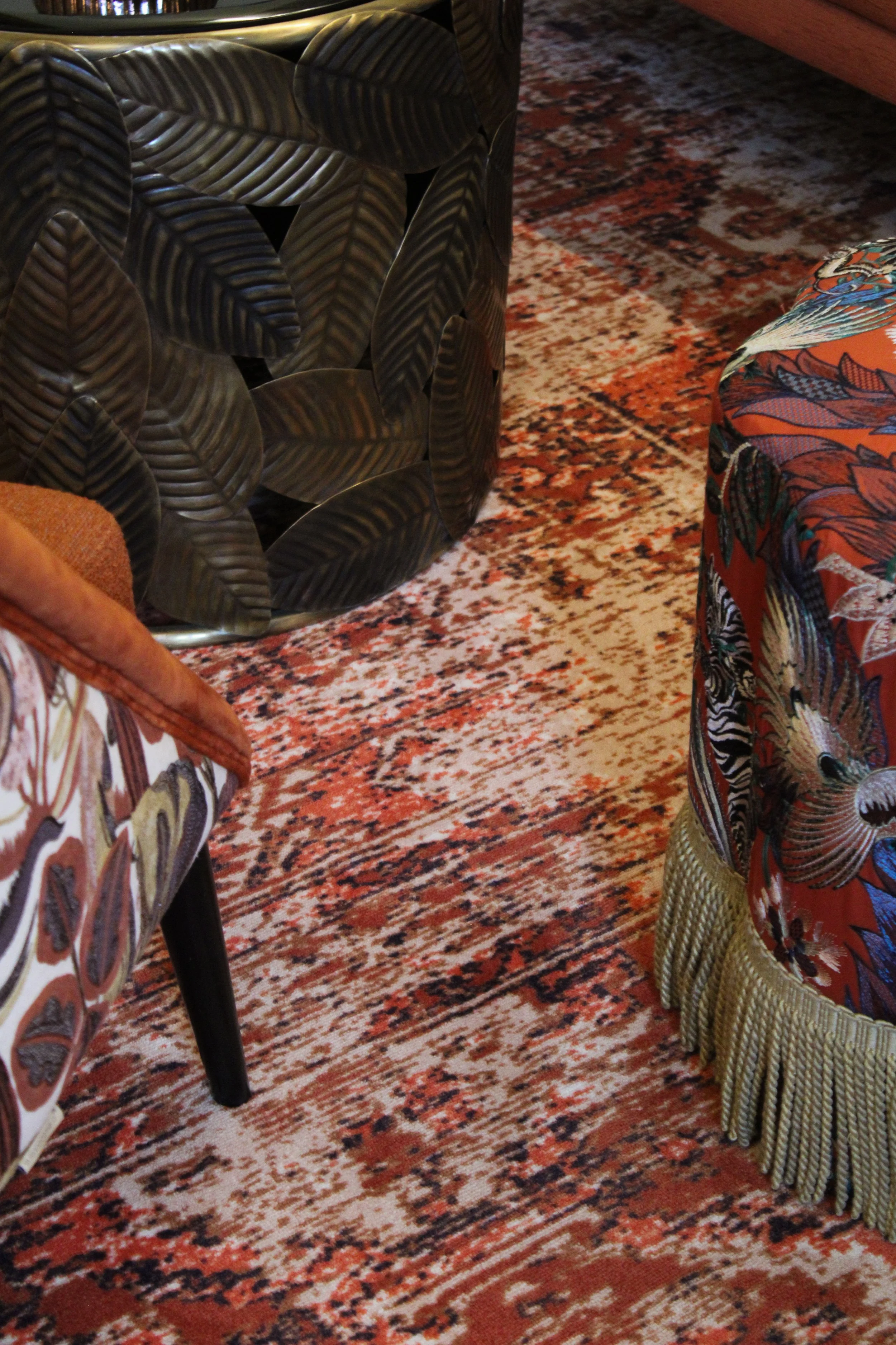 Close-up of bespoke furnishings with patterned upholstery and artisan interior details