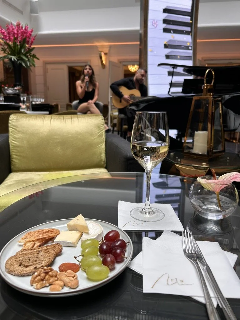 Live music performance with wine and gourmet bites in the Music Garden