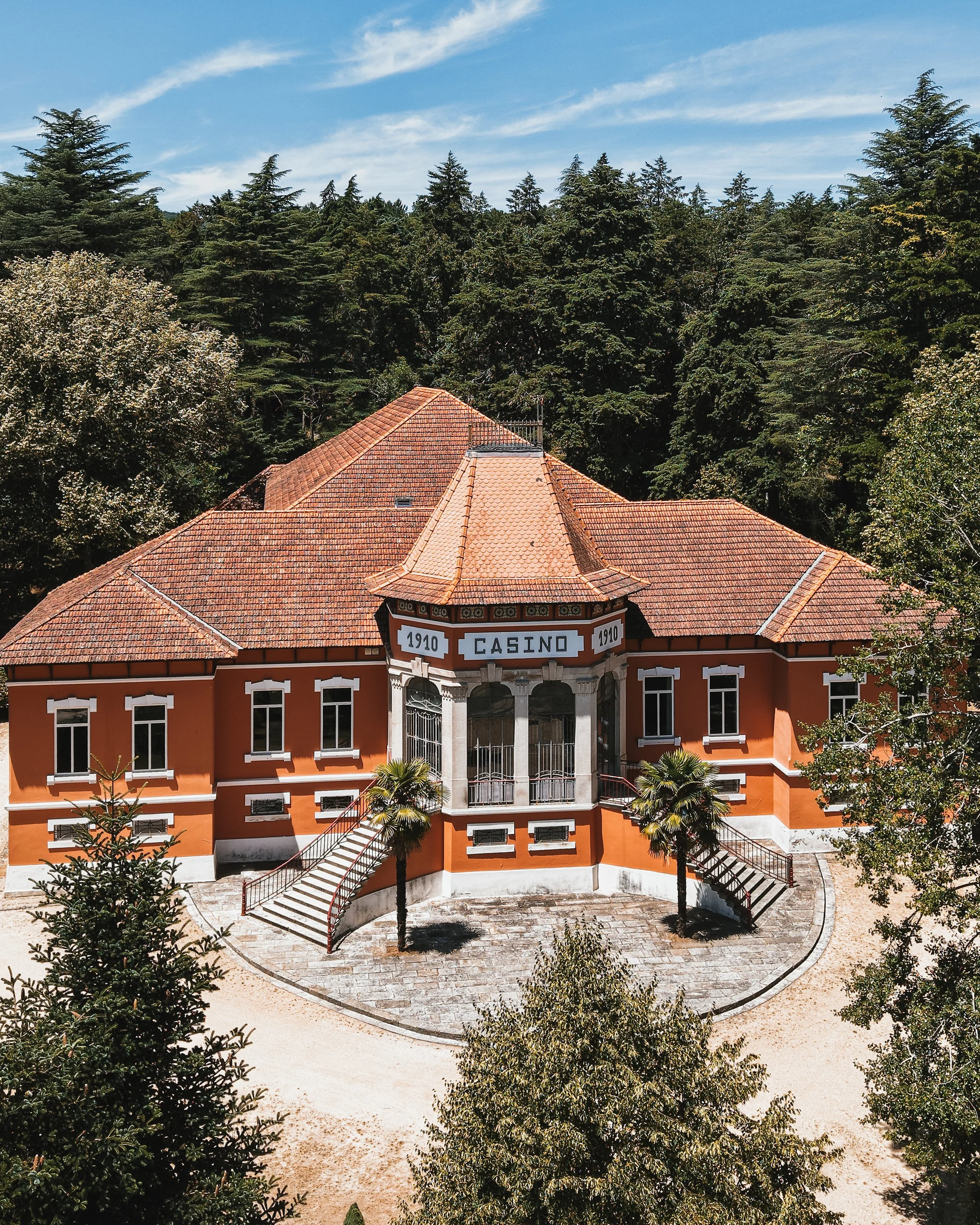 Historic casino building surrounded by centuries old woodland at the heart of the eco resort