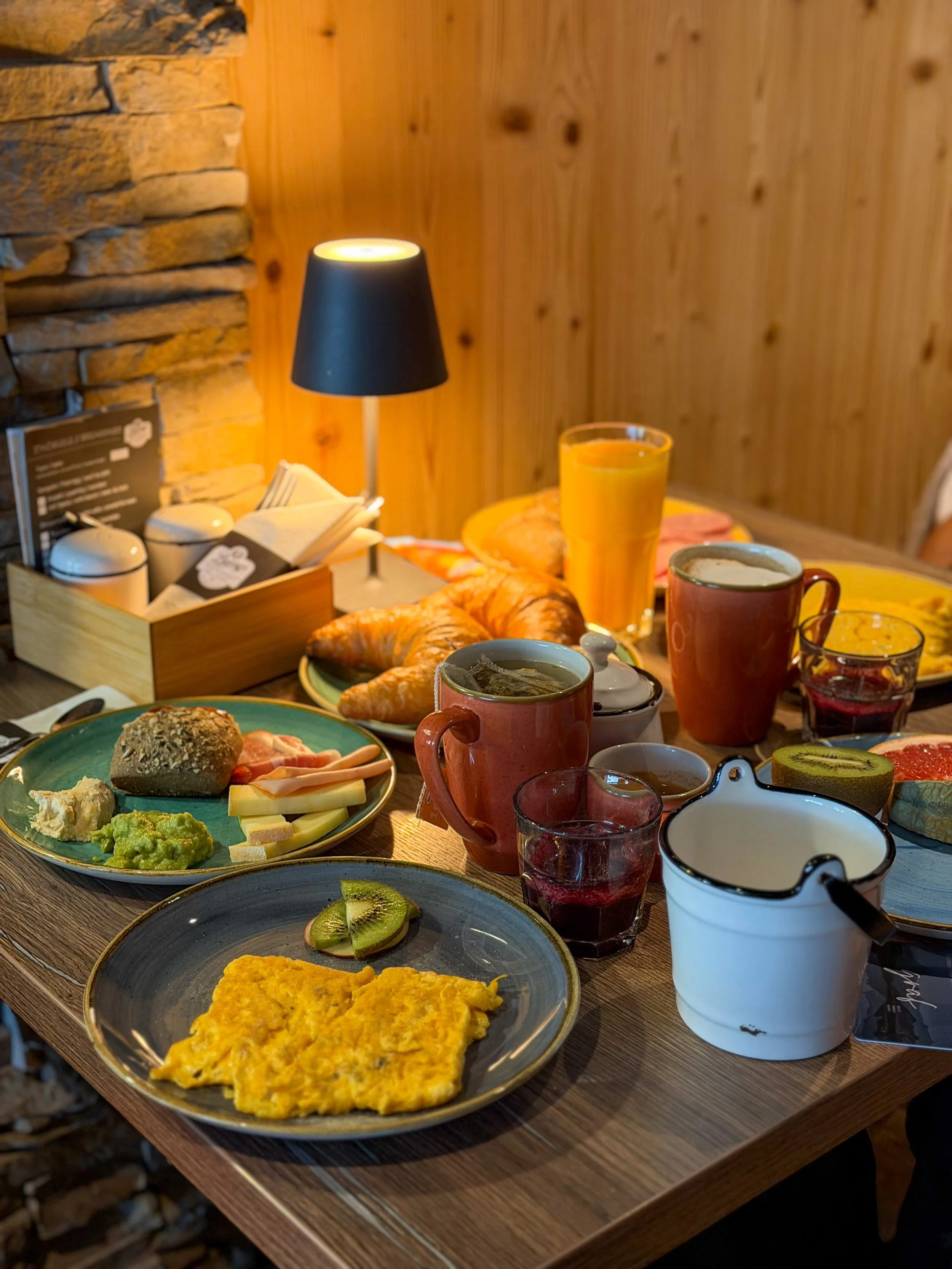 Generous breakfast spread featuring fresh pastries, local specialties and seasonal ingredients at Eiger Mountain & Spa Soul Resort