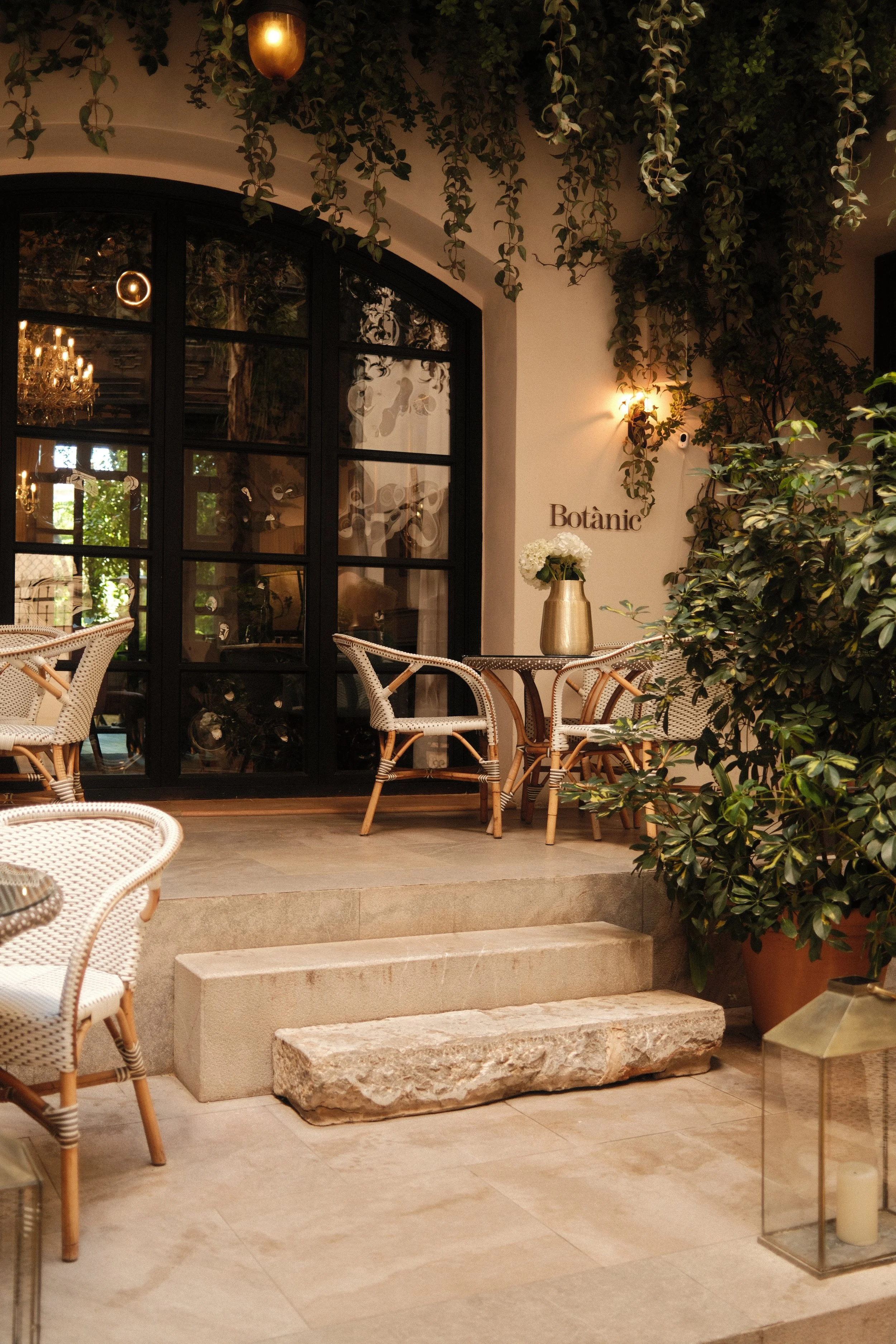 Botànic restaurant terrace offering refined dining in a tranquil garden courtyard