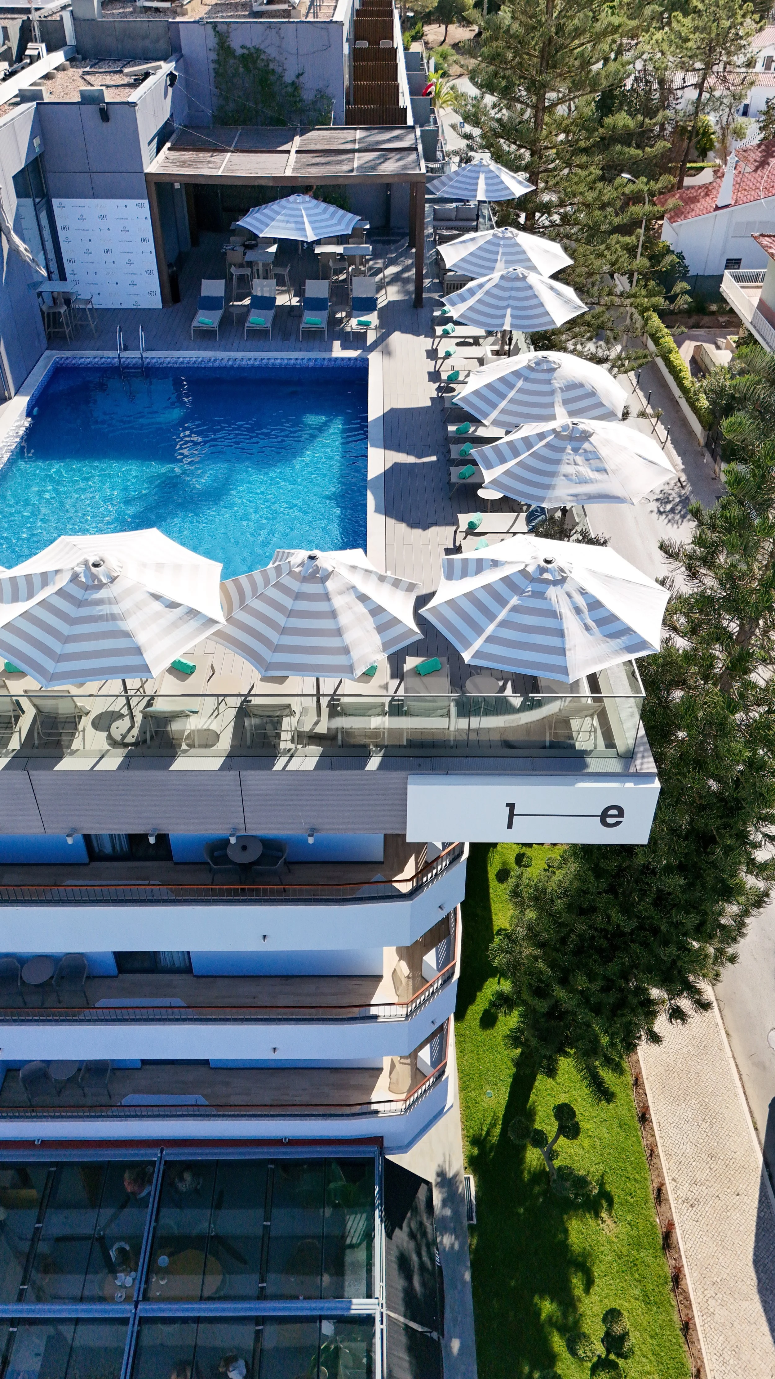Rooftop swimming pool with sun terrace at Pr1me Energize in Monte Gordo