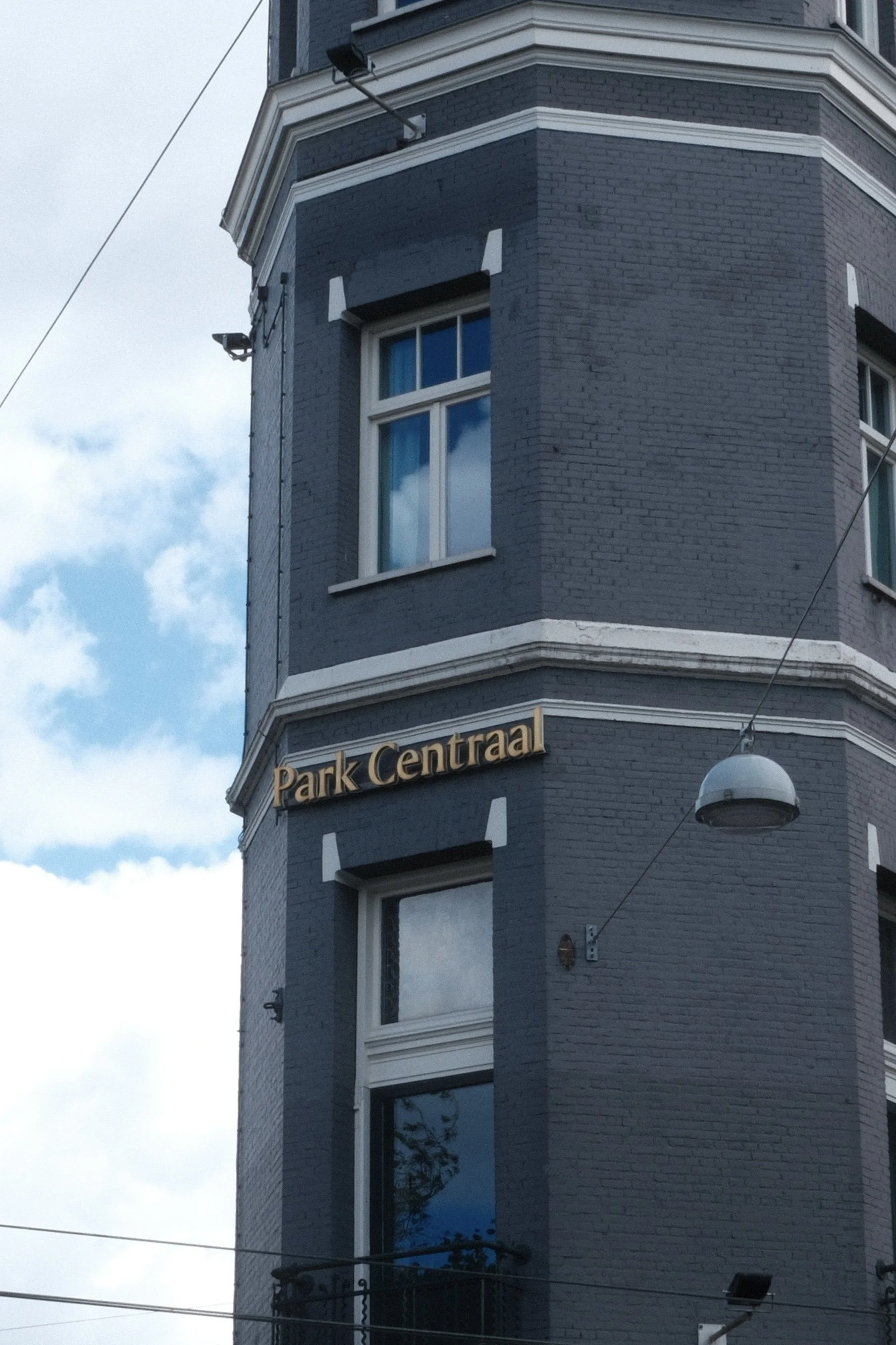 Historic corner façade of Park Centraal Amsterdam with classic Dutch architecture