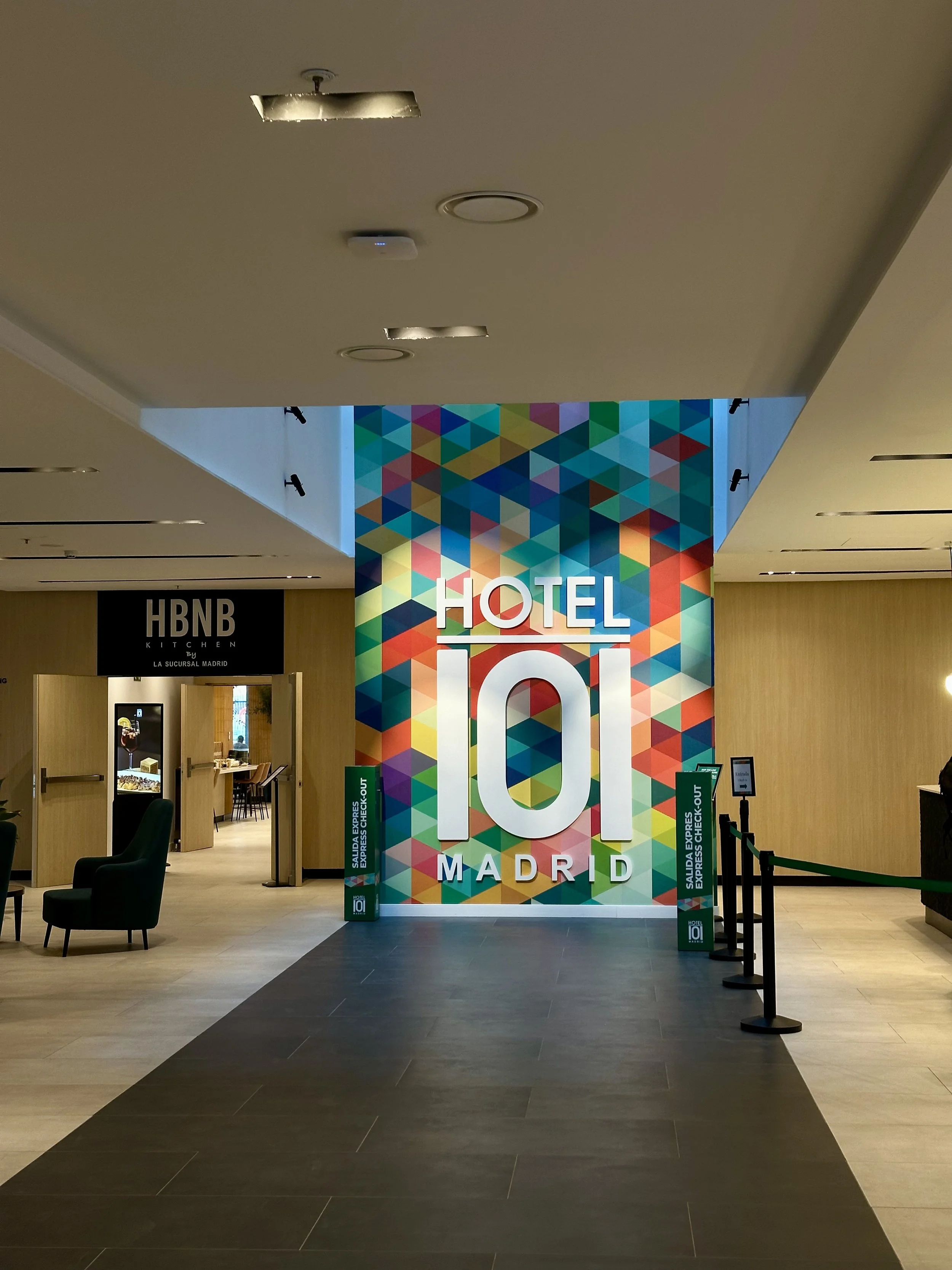 Vibrant lobby showcasing bold design, spacious interiors, and welcoming atmosphere