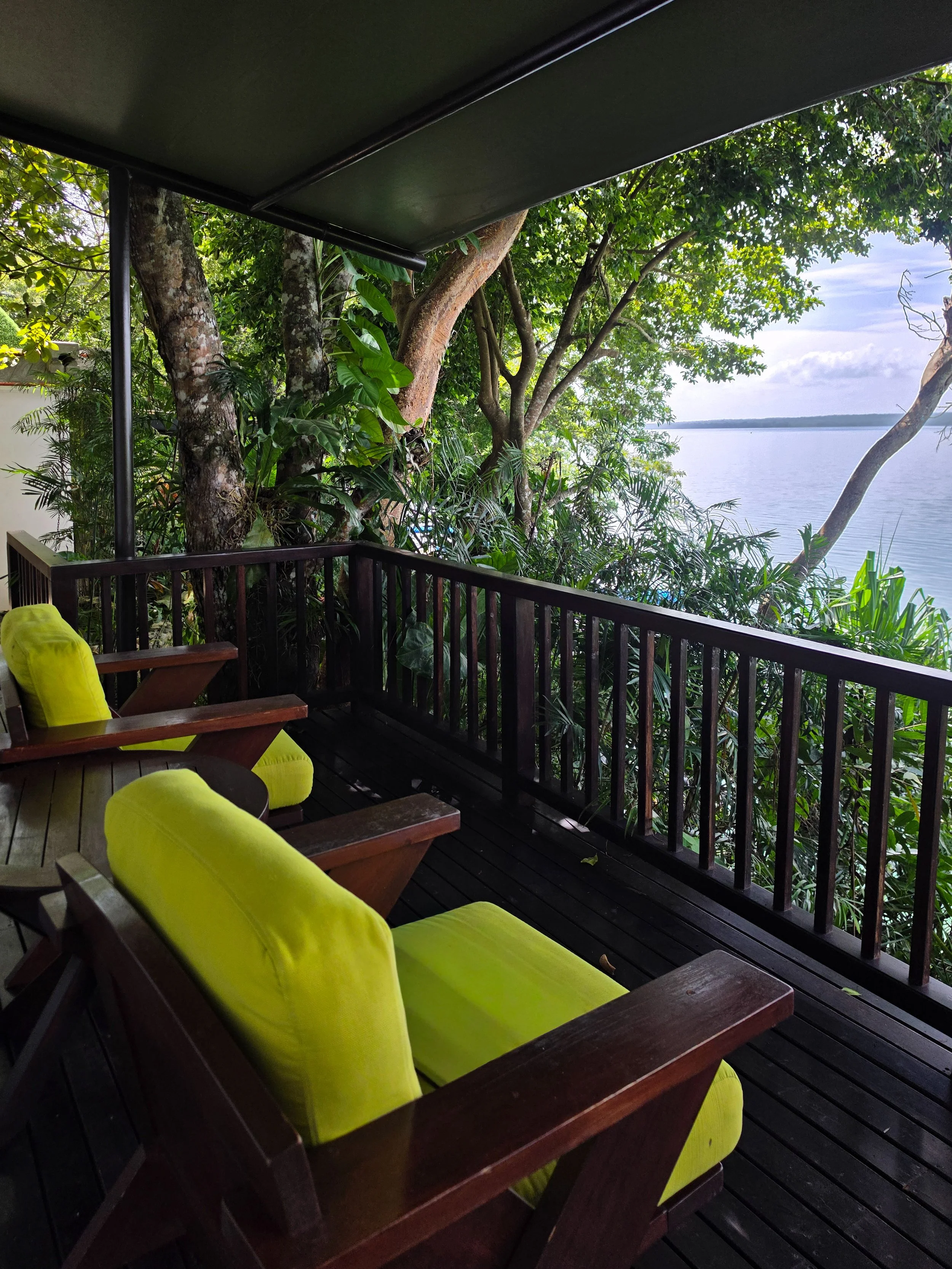 Private terrace immersed in nature with panoramic lake views