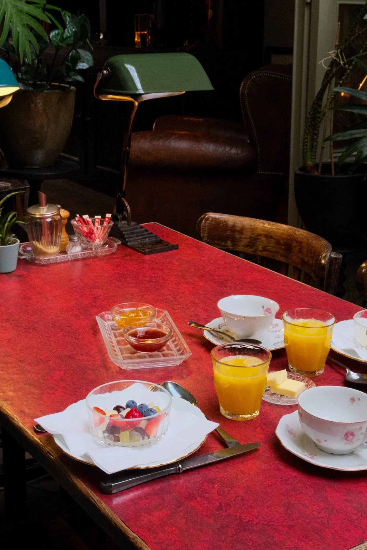 Breakfast table with fresh fruit, coffee, and homemade accompaniments